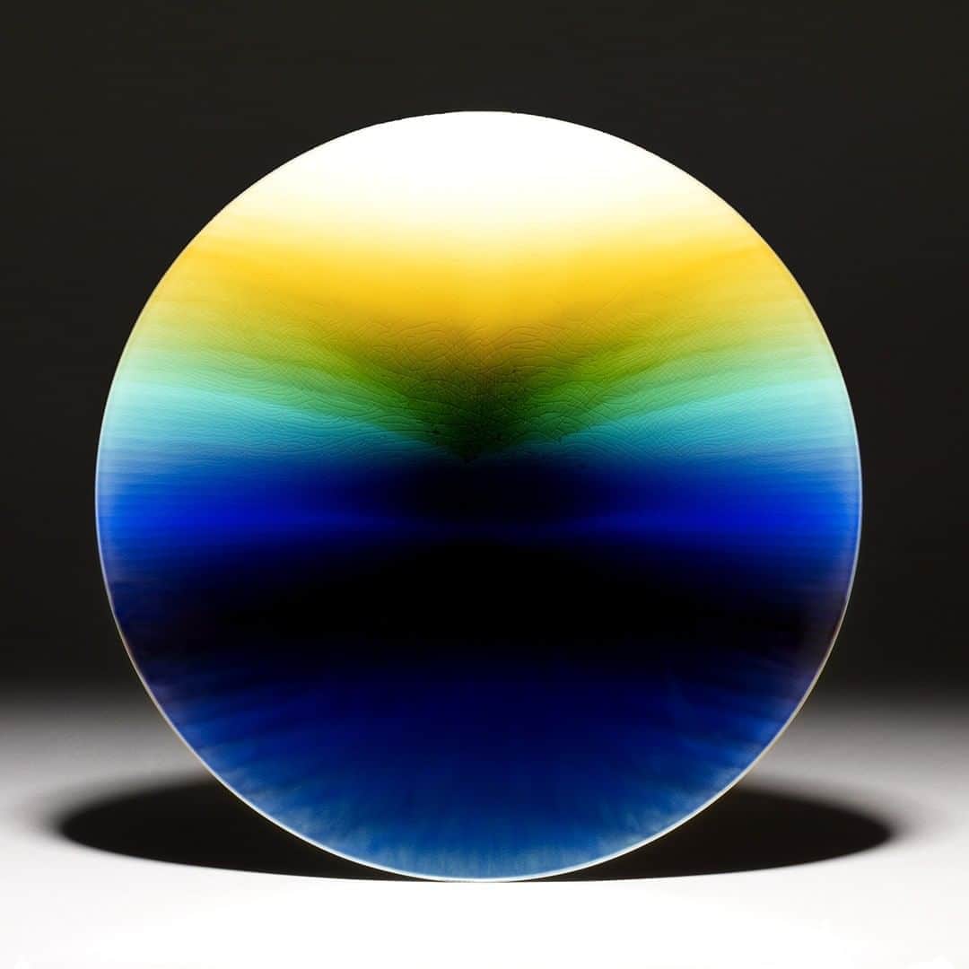 のインスタグラム：「‘Dawn is not only a beautiful object in its own right – it speaks of the future’s infinite possibilities’  Museum Trustee Clarissa Farr picked this wonderful ceramic plate to share as her inspirational object from the collection.   Clarissa says: ‘Deep in the Mitsubishi Corporation Japanese Galleries is a beautiful ceramic plate, a suspended celestial disc glowing with blue, green and yellow glaze, like liquid light.   Made in 1992, ‘Dawn’ by Tokuda Yasokichi III (1933–2009) shows us how a traditional Japanese glazing method has been given a mesmerizing modern interpretation through Yasokichi’s  blended, watercolour-like technique.’  Discover other inspirational objects selected by staff, Trustees and partners in our blog – link in bio. And follow #MuseumPassion today for more inspiring stories from museums across the UK.   🔎 Tokuda Yasokichi III (1933–2009), ‘Reimei’ 黎明 (Dawn). Large porcelain dish, glazed in blue, green and yellow, 1992.   #BritishMuseum #ceramics #MuseumPassion #JapaneseArt #TakudaYasokichi #HereForCulture」