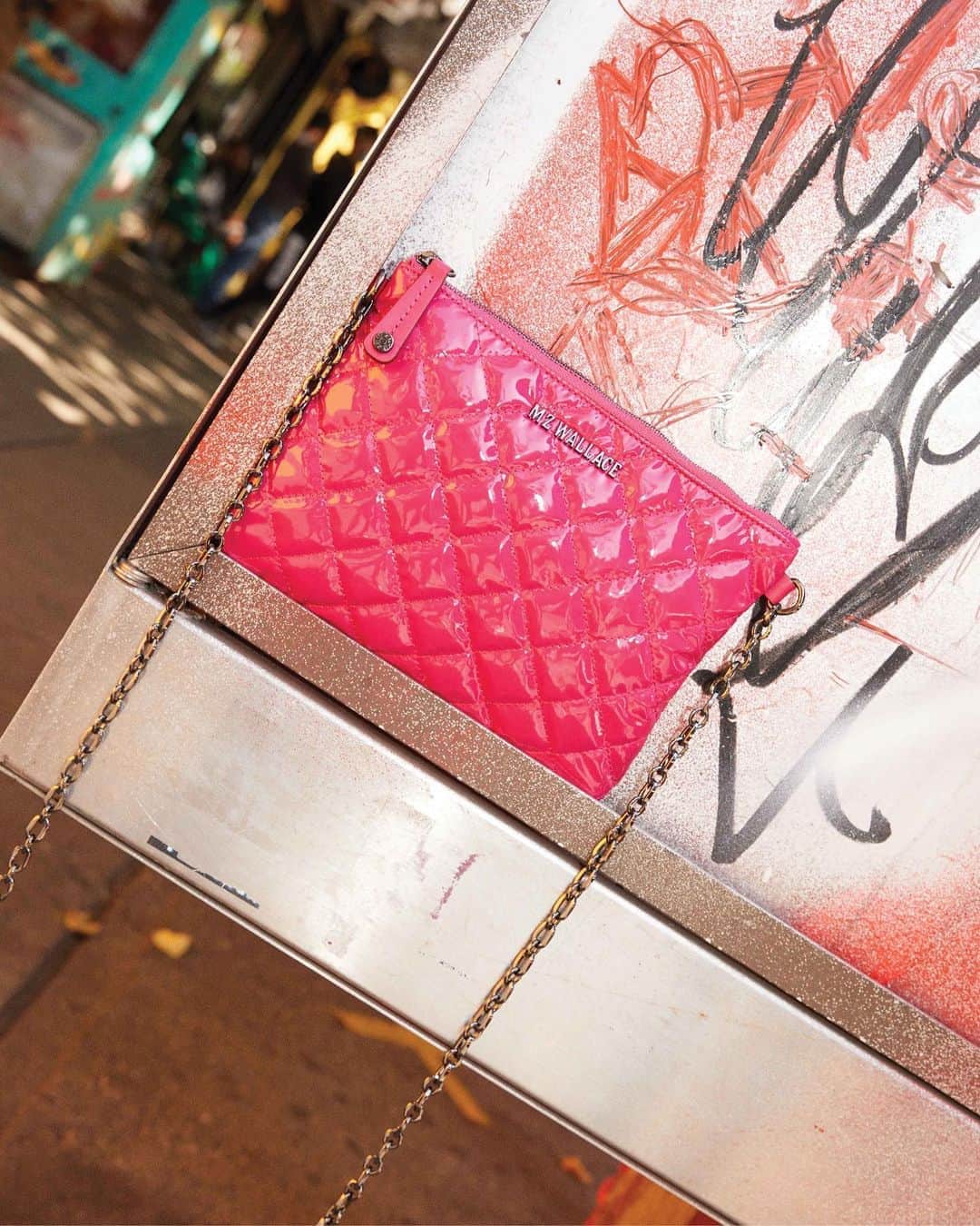 MZウォレスのインスタグラム：「Elevate your outfit with our new arrival, Ruby! A small bag that packs a big style punch, you'll be surprised by how much it fits.   Head to the link in our bio to shop the Lacquer Collection!」