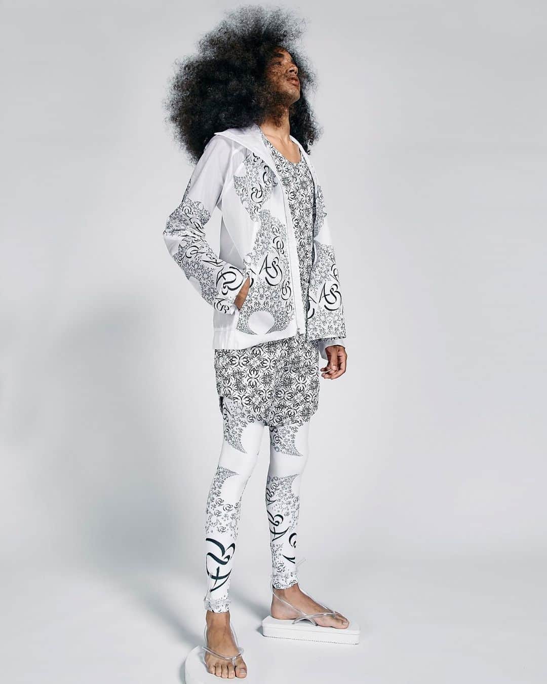 のインスタグラム：「Our New collection “Vesica Piscis” is out on @voguerunway  Photographer : Elisabet Davids @elisabet_davidsdottir @elisabetd  Model: Joseph Gelpi @chicojoseph at Ford Models  @fordmodels  Stylist : Victoria Bartlett @victoria_bartlett_nyc  Hair: Kenta Koda @kenta.koda  Makeup: Chichi Saito @chichisaito  Prints in collaboration with Mimaki  @mimakiusa @mimakiusa_textile  @threeasfour #threeasfour #vesicapiscis」