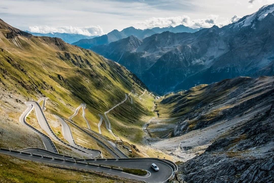 National Geographic Travelさんのインスタグラム写真 - (National Geographic TravelInstagram)「Photo by @francescolastrucci / A view of some of the 48 hairpin turns near the top of the eastern slope of the Stelvio Pass, which climbs to an elevation of 2,757 meters (9,045 feet) above sea level and is fringed by the Ortles-Cevedale peaks. It is the highest paved mountain pass in Italy and the second highest in the Alps. It links the Lombardy and South Tyrol regions during the summer season, when it’s clear from the snow. The spectacular winding road is certainly one of the most exciting in Europe. The 49-kilometer (30-mile) queen of the mountain roads was built between 1820 and 1825 and has been the scene of some legendary cycling races.  Follow me @francescolastrucci for more places, daily life, and stories around the world. #mountains #italy #dailylife」10月31日 11時34分 - natgeotravel