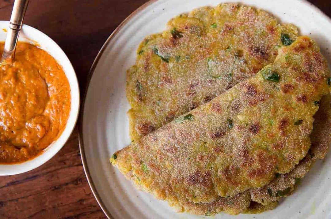 Archana's Kitchenさんのインスタグラム写真 - (Archana's KitchenInstagram)「Wishing all of you a very happy #Navratri.  Try this Rajgira Paneer Paratha (Vrat Recipe), it is an Indian flatbread made by mixing amaranth flour with paneer as the binding agent and flavoured with Indian spice and rolled out thin and toasted on a flat pan till it is crispy on both the sides. Having this along with tomato chutney and tell us how you enjoyed it! Get the recipe from the smart.bio link in my profile @archanaskitchen . . . . . . #recipes #easyrecipes #breakfast #Indianbreakfast #archanaskitchen #healthyeating #highprotein #breakfastclub #dosa #dosarecipes #dosabatter #ragi #ragidosa #mysoremasaladosa #homemadefood #eatfit #cooking #food #healthyrecipes #foodphotography #recipeoftheday #comfortfood #deliciousfood #delicious #instayum #food」10月17日 11時12分 - archanaskitchen