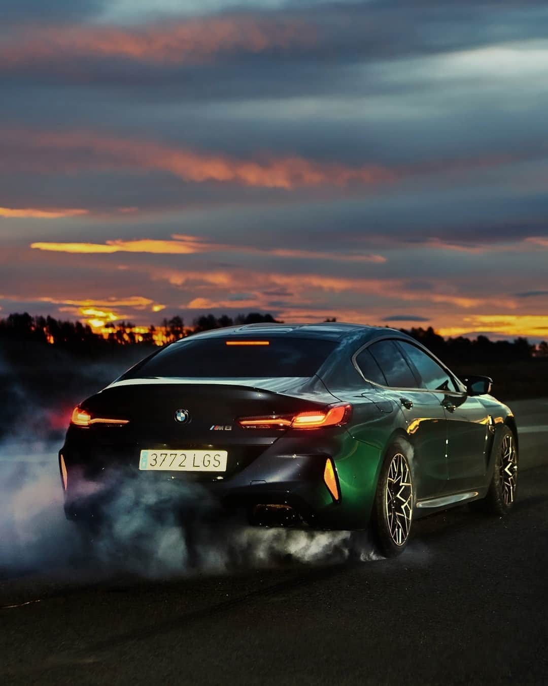 BMWのインスタグラム：「Just one of those ride-off-into-the-sunset kinda nights.  The BMW M8 Gran Coupé First Edition. #TheM8 #BMW #M8 #BMWM @bmwm __ BMW M8 Gran Coupé: Fuel consumption in l/100 km (combined): 10.7–10.5. CO2 emissions in g/km (combined): 244–240.* Further information: www.bmw.com/disclaimer.  	 Acceleration (0-100 km/h): 3.3 s. Power: 441 kW, 600 hp, 750 Nm. Top speed (limited): 250 km/h (with optional M Drivers Package: 305 km/h).  	 * All performance, fuel consumption and emissions figures are provisional.」