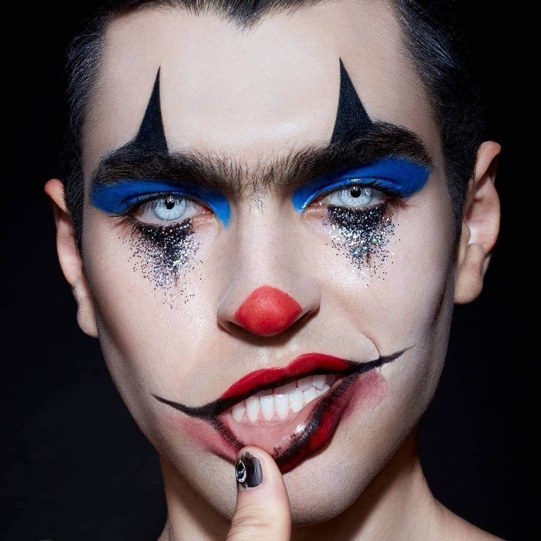 のインスタグラム：「Down to clown? Get ready for the ZOOM parties and share your #MACHalloweenFromHome snaps with us to be featured⁠ Makeup Artist: @raisaflowers⁠ Model: @miguelonch_1⁠ ⁠ 🤡Pro Longwear Fluidline in Blacktrack⁠ 🤡Acrylic Paint in Black Black and Hi-Def Cyan⁠ 🤡Glitter in 3D Black and Silver Hologram⁠ 🤡Retro Matte Liquid Lipcolour in Fashion Legacy⁠ 🤡Pro Longwear Paint Pot in Painterly ⁠ 🤡Eye Shadow in Amber Lights⁠ 🤡Studio Fix Fluid SPF 15⁠ #MACHalloween #HalloweenLooks #HalloweenBeauty #MACCosmeticsUK⁠」