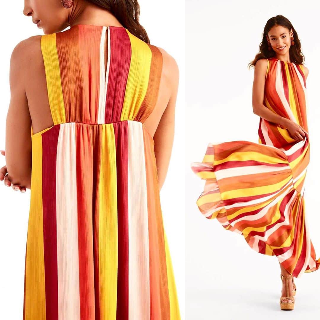 サッチン+バビのインスタグラム：「If there was a dress that makes you smile, Marissa would be it. This fluid maxi in crinkle georgette is a spectacular combination of effortless chic and bold, unadulterated color, culminating in a uniquely beautiful statement dress. #dreamincolor, #sachinandbabi, #fallcolor」