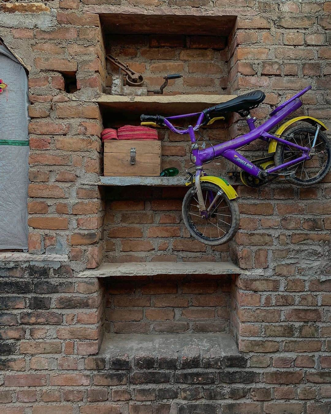 ジョン・スタンメイヤーさんのインスタグラム写真 - (ジョン・スタンメイヤーInstagram)「Things I was curious for, hanging around India… A very red bicycle belonging to Gurneel Kaur’s grand daughter, in her very red courtyard in Mari Mustafa, Punjab… met a shy room fan with a most purplish color, hiding inside a chai shop of my favorite colors in Chandauli, Uttar Pradesh, moving air to no one around the corner… and a very purple bicycle defying gravity at Kanthi’s home in Aswar Village near Bhind, Madhya Pradesh. All #nothingspecial, I just enjoy how they feel together. ⠀⠀⠀⠀⠀⠀⠀ India’s Daunting Challenge: There’s Water Everywhere, And Nowhere - Chapter 8 of the @outofedenwalk, my latest story in the August 2020 of @natgeo magazine. ⠀⠀⠀⠀⠀⠀⠀ #triptych #bicycles #fan #homes #nothingspecial #MariMustafa #punjab #chandauli #UttarPradesh #aswar #MadhyaPradesh #peace #love #india @natgeo @outofedenwalk #walkingindia #edenwalk」10月18日 11時33分 - johnstanmeyer