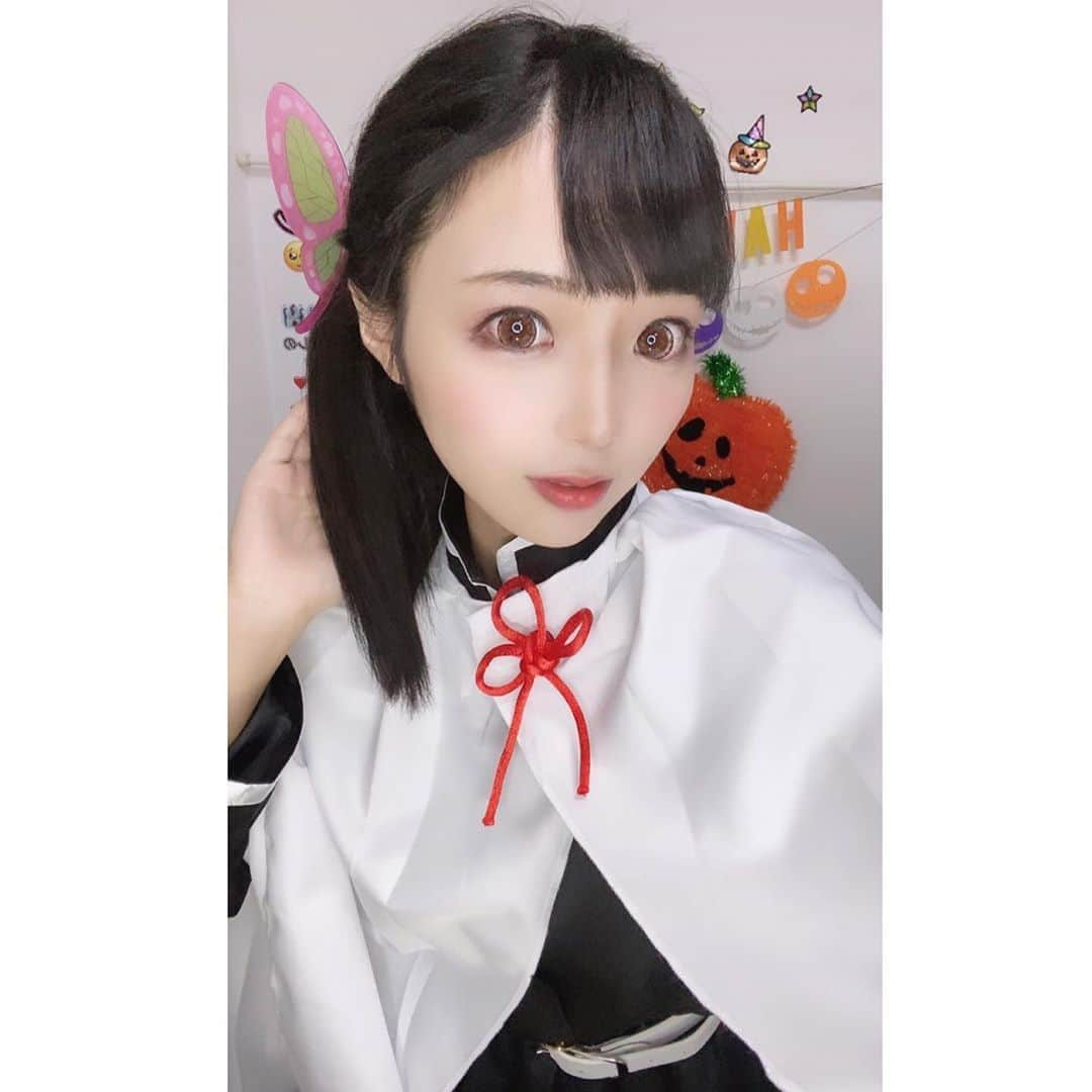 なつみさんのインスタグラム写真 - (なつみInstagram)「ハロウィン🎃コスプレ祭りVol.10 10月17日は鬼滅の刃🗡栗花落カナヲ🦋でした✨  いつもと雰囲気が違うのは、初めてピンクの カラコンを付けてみたからです( งᵒ̴̶̷᷅ωᵒ̴̶̷᷄)ง💖 私は伊之助とカナヲ推しです🥰 鬼滅の映画、みんなはもう見たかな？💞  #ライブ配信#Pococha#Pocochaライバー#ポコチャ#ライバー#バセドウ病#吃音症#八重歯#宅建士#宅建#宅地建物取引士#不動産営業#イギリス留学#🧢なつみ👻🍊Natsumi#鬼滅の刃#鬼滅#無限列車編#栗花落カナヲ#カナヲ#カナヲコスプレ#ハロウィンコスプレ」10月18日 17時38分 - natsumipeanuts