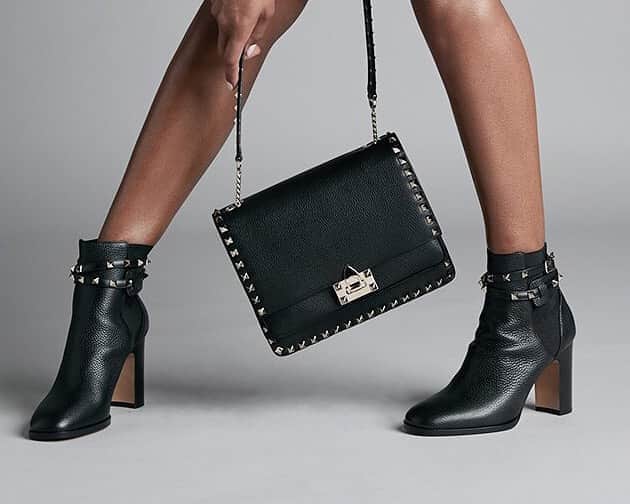 GILTのインスタグラム：「We always regret the #Valentino we didn’t buy. Tap to shop the Rockstud Leather Bootie and Shoulder Bag.」