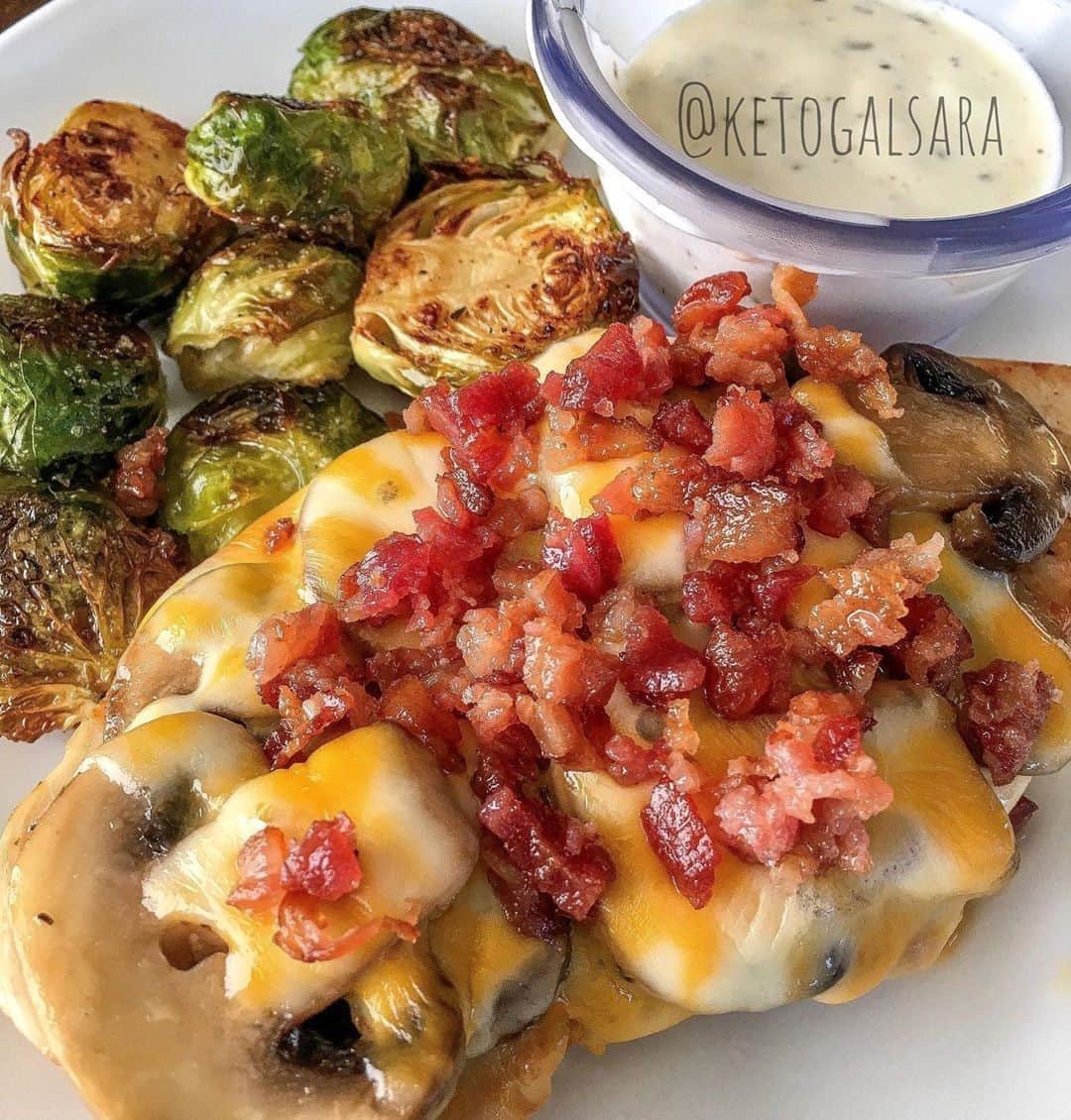 Flavorgod Seasoningsさんのインスタグラム写真 - (Flavorgod SeasoningsInstagram)「Flavor God Seasoned chicken with baked Brussel sprouts by customer @ketogalsara⁠ -⁠ Seasoned with FlavorGod Garlic Herb & Salt⁠ -⁠ KETO friendly flavors available here ⬇️⁠ Click link in the bio -> @flavorgod⁠ www.flavorgod.com⁠ -⁠ 🔹Chicken was seasoned with @flavorgod garlic and herb salt..⁠ 🔹placed on oiled air fryer rack and cooked 360° for 15 minutes flipping halfway. (Time varies greatly depending on thickness of meat)⁠ 🔹Topped with sautéed mushrooms, slice of cheese and bacon crumbles.⁠ .⁠ .⁠ 🔹Brussels sprouts were cut in half. .⁠ 🔹placed on parchment paper lined baking pan⁠ 🔹sprayed with olive oil⁠ 🔹generously seasoned with @flavorgod garlic and herb salt⁠ 🔹Then baked at 400° for 25 minutes flipping halfway. 🔹Dunk in ranch and enjoy. .⁠ .⁠ Tag a friend who needs this in their life 🤤#airfryer⁠ -⁠ Flavor God Seasonings are:⁠ ✅ZERO CALORIES PER SERVING⁠ ✅MADE FRESH⁠ ✅MADE LOCALLY IN US⁠ ✅FREE GIFTS AT CHECKOUT⁠ ✅GLUTEN FREE⁠ ✅#PALEO & #KETO FRIENDLY⁠ -⁠ #food #foodie #flavorgod #seasonings #glutenfree #mealprep #seasonings #breakfast #lunch #dinner #yummy #delicious #foodporn」10月19日 8時15分 - flavorgod