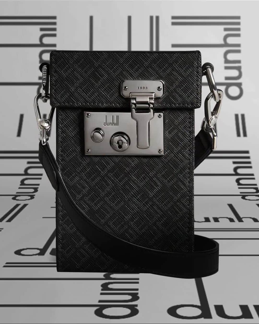 のインスタグラム：「SIGNATURE COLLECTION⁠ #dunhillAW20⁠ #dunhillLOCKBAG  ⁠ Introducing a new range of bags and accessories inspired by the iconic dunhill longtail logo. Specifically, archive designs from the 1970s, where House prints and packaging motifs are reimagined for today.⁠ Featured here, the Lock bag. ⁠ Constructed from a lightweight, subtly textured coated cotton canvas with an all-over geometric pattern; specially treated to improve water resistance and durability. Finishing touches include palladium-plated silver-finish hardware and soft, full grain cowhide trims tanned in Italy. ⁠ ⁠ Follow the link in our bio to view the collection and the story behind it. ⁠  ⁠DUNHILL.COM」