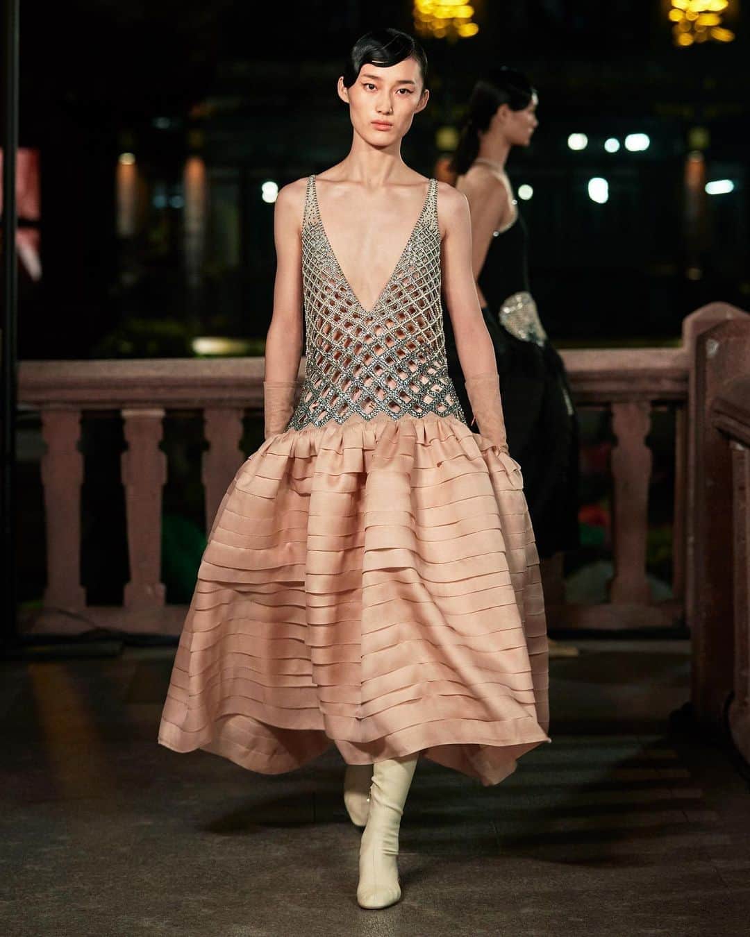 ランバンのインスタグラム：「Jeanne Lanvin’s signature robe de style - a breathtaking romantic hooped dress, itself originally inspired by the silhouettes of the 18th century - is a foundational silhouette. Anchoring the house to its heritage, the volume of the robe de style is recontextualised in tailoring and soft coats. Always connecting Lanvin to the idea of youth, the robe de style traces silhouettes expressive of the Lanvin logo, la Femme et l’Enfant, and the illustrations of Georges Lepape of these characters in different situation. For Spring/Summer 2021, @brunosialelli rediscovers these emblematic styles of the house - they become personae, heroes and heroines in a new representation of Lanvin for tomorrow. #LanvinYUGARDEN #Shanghaifashionweek」