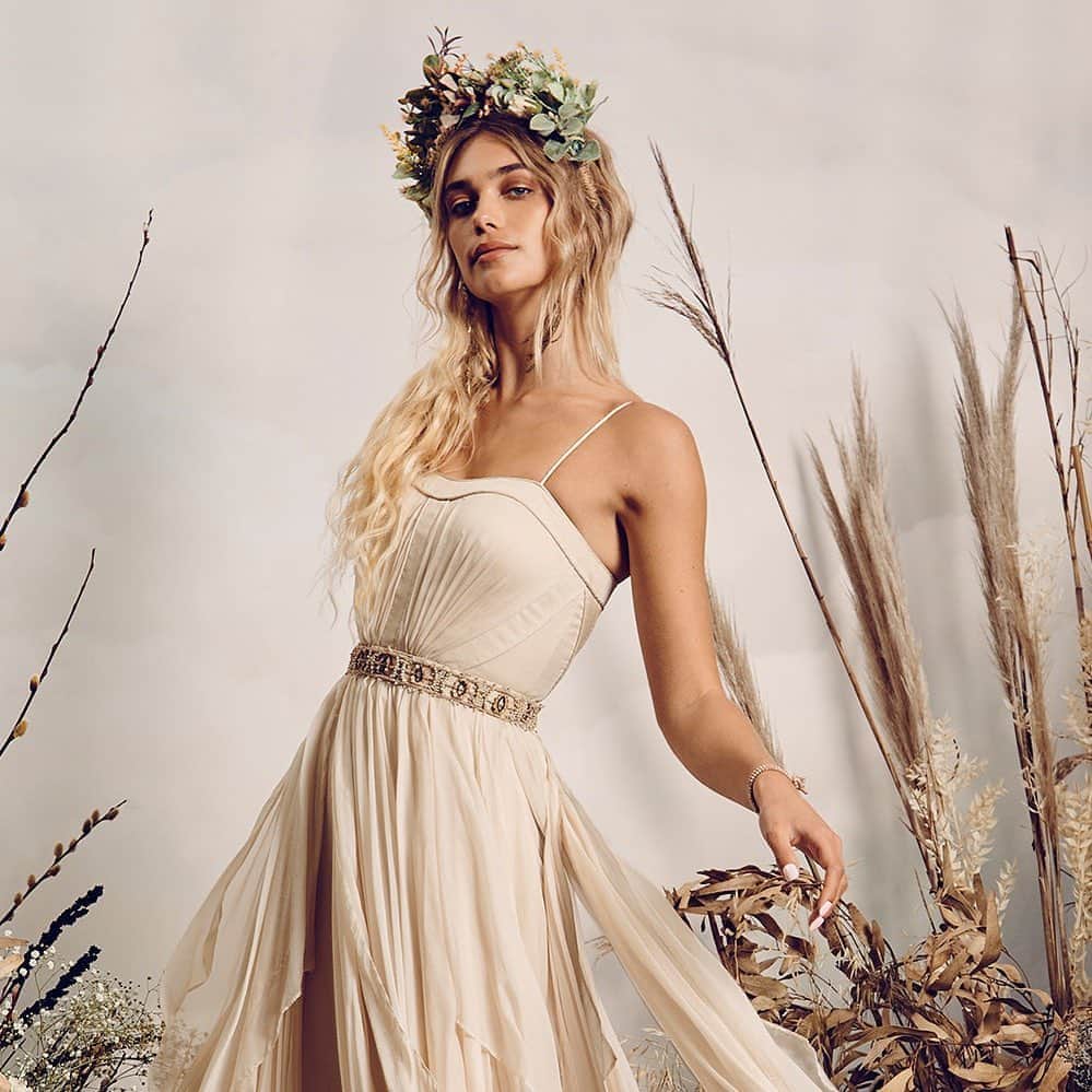 のインスタグラム：「Slip into a dream with this lovely vintage number. Made from pure silk and chiffon, Cascada is best paired with a flirtatious nature, a beautiful forest, and not a care in the world. (belt not included)🌸  A reminder that ALL proceeds of our vintage collection will be going to the incredible charity @theunlimited_child because it’s cool to be kind.  Buy now by clicking on the link in bio 😘  #weddingdress #weddingdressinspiration #weddinggown #weddinggowndesigner #bridalcouture #CDbride #cdloves #catherinedeanebride #catherinedeane #celebration #vintage #childrenscharity #charity #fundraiser #sustainablefashion #sustainability  CREDITS: Model: Danika Pienaar @danikapienaar from @bossmodelsa @freedommodelsla Photographer: Michael Oliver Love @michaeloliverlove from @herocreativemanagement Set Stylist: Gabi Lee Goetze @glgoetze Hair and Makeup: Alet Viljoen @aletviljoenhairandmakeup from @supernovacm BTS videographer and finish artist: Jean-Pierre Gouws @blnkfoto Creative director, stylist and production: Angelique Jansen van Rensburg @angelique_themermaid」