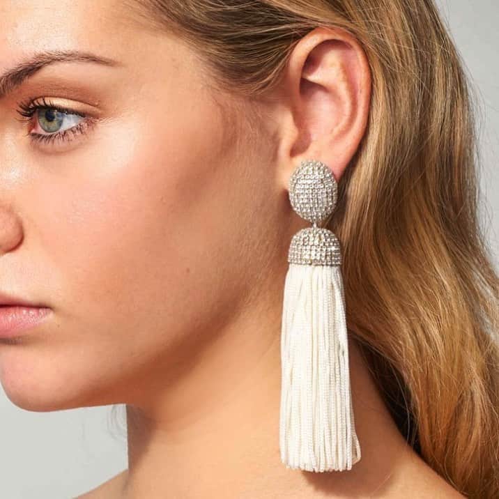 のインスタグラム：「The Hillary tassel and pave, dramatic drop earring in ivory. Classic crystals are combined with the elegant sway of individual yarns.」