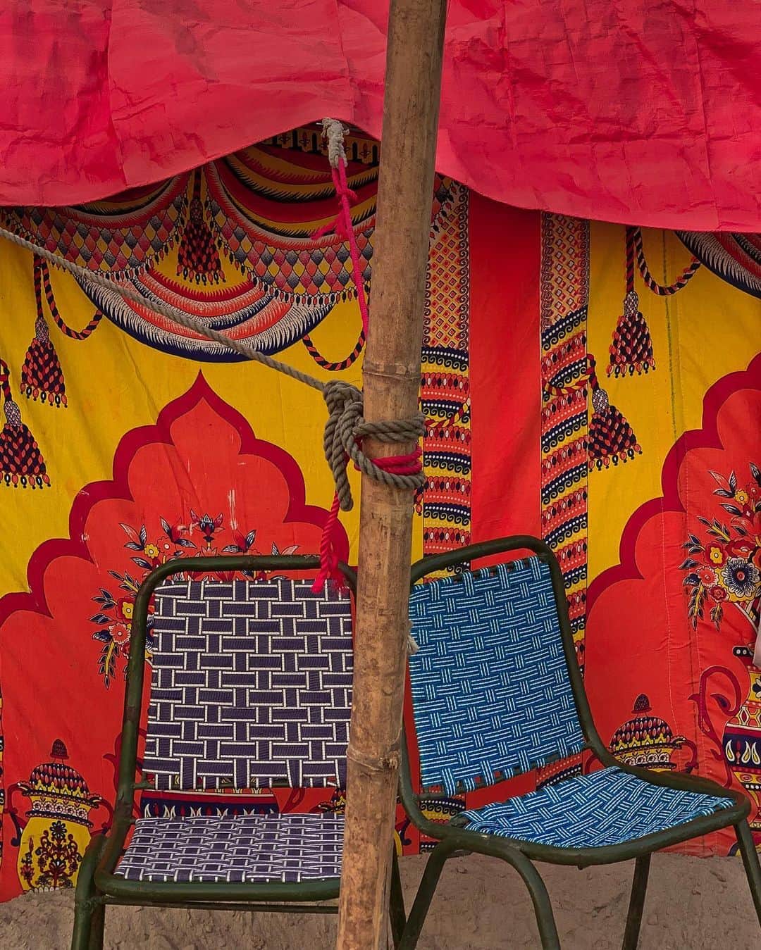 ジョン・スタンメイヤーさんのインスタグラム写真 - (ジョン・スタンメイヤーInstagram)「Two chairs, two green flip-flops, two tin cans, things in pairs stumbled upon in India… Chairs outside the dripping orangey-red prayer tent in the ashram we stayed during the 2019 Kumbh Mela in Prayagraj, Uttar Pradesh… @ankitha_rs’s green flip-flops, outside her door at the reddest of red hotels ever in Borjhar, Assam… Two trash cans at a home in Bhind, Madhya Pradesh, resting against a mighty pink wall when the light kissed it yellow near sunset. Once again, all #nothingspecial, until noticing magical patterns before all of us, coming as one together. ⠀⠀⠀⠀⠀⠀⠀ India’s Daunting Challenge: There’s Water Everywhere, And Nowhere - Chapter 8 of the @outofedenwalk, my latest story in the August 2020 of @natgeo magazine. ⠀⠀⠀⠀⠀⠀⠀ #triptych #pink #red #chairs #prayagraj #allahabad #UttaraPradesh #green #flipflops #blue #curtain #borjhar #assam #tincans #sticks #sunlight #bhind #MadhyaPradesh #peace #love #india @natgeo @outofedenwalk #walkingindia #edenwalk」10月20日 10時17分 - johnstanmeyer