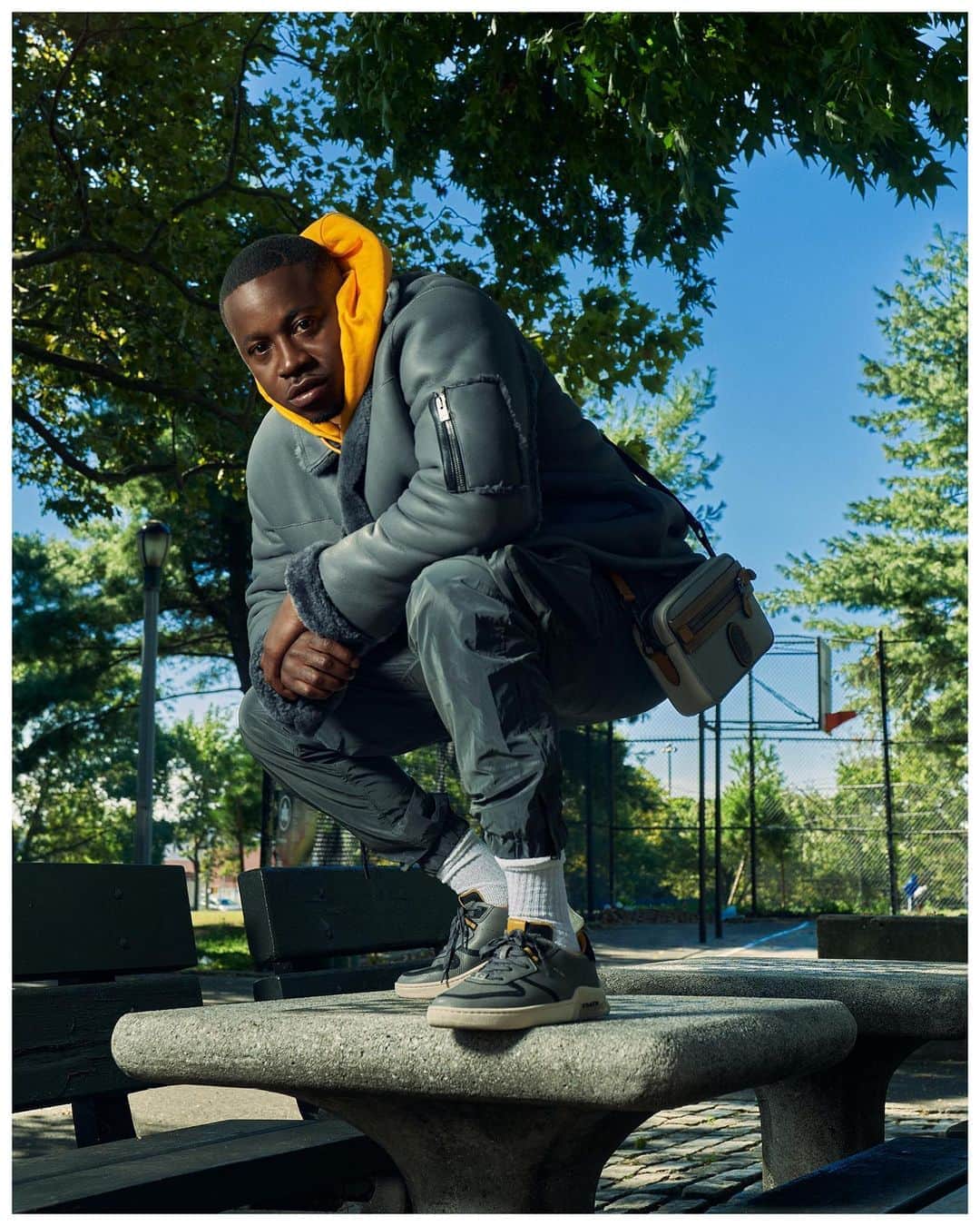 コーチさんのインスタグラム写真 - (コーチInstagram)「Big in Queens. Fashion designer #RaDolla knows how to pull off a fit (and strike a pose, too). Part of #NigelSylvester’s hometown fam, he’s wearing our Plush Snap Front Jacket at Peters Field park in Queens. #CoachNY  Photographed by: @joshuakissi Styled by: @clay_visions」10月20日 22時13分 - coach