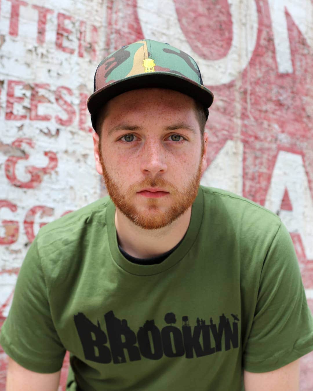 ブルックリンインダストリーズのインスタグラム：「Adam in the Camo 278 Trucker Cap and Buildings Graphic. #brooklynindustries #liveworkcreate」