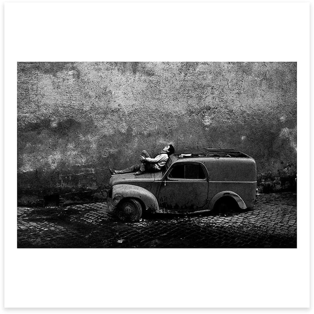 Magnum Photosさんのインスタグラム写真 - (Magnum PhotosInstagram)「“The old automobile abandoned in a Roman cul de sac⁠ Is a vessel for the dreams of children.⁠ The cobblestone street and the damp wall⁠ Are decorations for the party.⁠ And as for the child asleep on the hood, he sails the southern seas.” – Tahar Ben Jelloun. Text extracted from Bruno Barbey’s book The Italians.⁠ .⁠ Works of Imagination, the October Magnum Square Print Sale in partnership with @aperturefnd is live on the Magnum Shop until this Sunday.⁠ .⁠ This is a unique opportunity to purchase signed or estate-stamped museum-quality prints by over 100 of the world’s leading photographic artists in an exclusive 6x6” format for $100.⁠ .⁠ Visit the link in bio to shop all the images available.⁠ .⁠ PHOTO: Rome, Italy. 1962.⁠ .⁠ © Bruno Barbey/#MagnumPhotos⁠ ⁠ #MAGNUMSQUARE #WorksofImagination #printsale」10月21日 0時02分 - magnumphotos