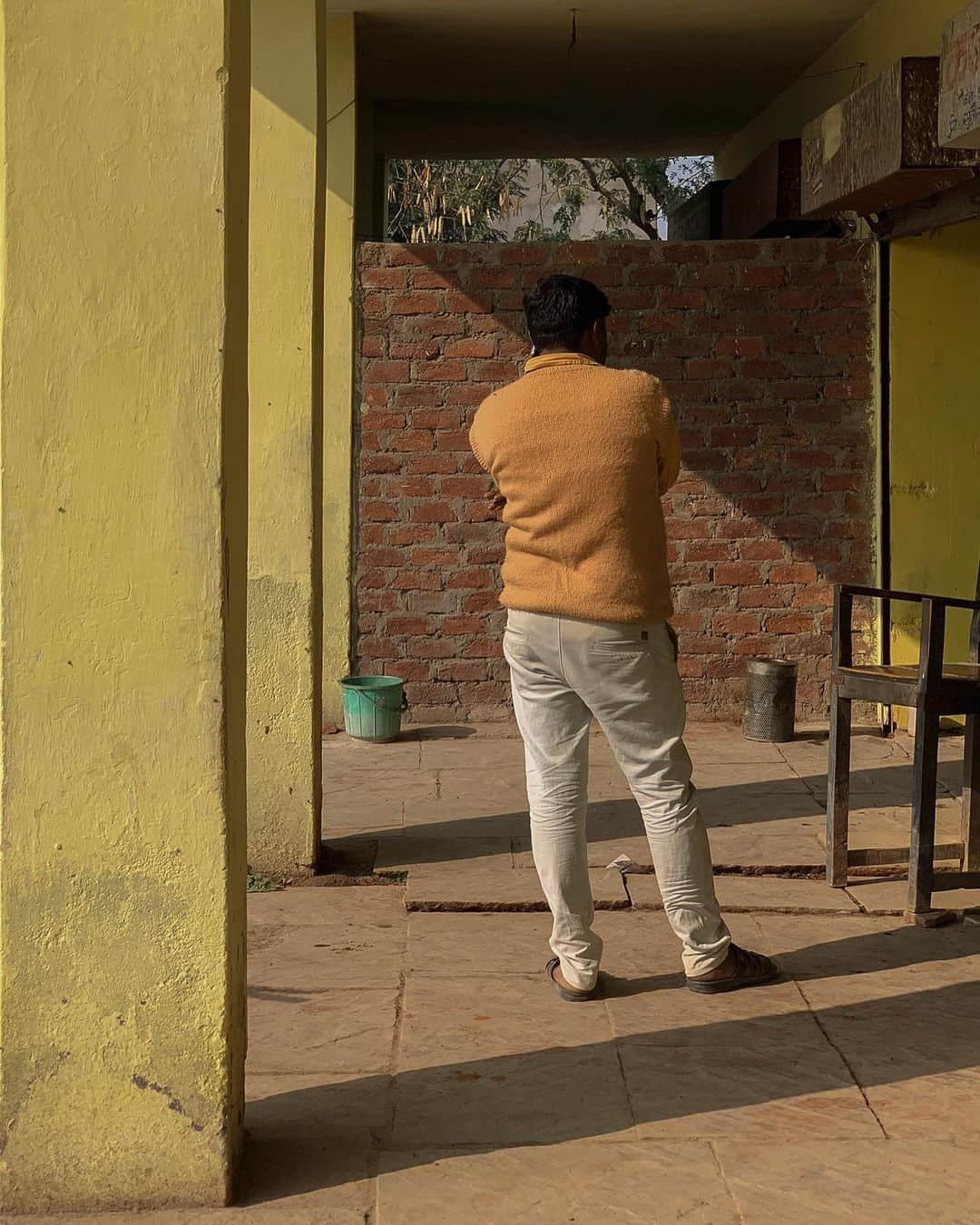 ジョン・スタンメイヤーさんのインスタグラム写真 - (ジョン・スタンメイヤーInstagram)「A few more people I met while traveling across north India… A man in an orange sweater talking so loudly on his phone, he turned his back as if we could not hear, standing in a very yellow building in Jarara, Madhya Pradesh. All I was hoping during this rest stop was a quiet cup of chai… Jesus, hanging around Ferozepur in Punjab, where yes, I was also drinking chai at a table close to him… A little boy, so shy and sweet, at a welcoming home in Aswar, also in MP. We were offered cups of, yup, you guessed it, chai. This time with cardamon. Just a touch bit more of #nothingspecial becoming special amongst the magical pieces of simpleness in life. ⠀⠀⠀⠀⠀⠀⠀ India’s Daunting Challenge: There’s Water Everywhere, And Nowhere - Chapter 8 of the @outofedenwalk, my latest story in the August 2020 of @natgeo magazine. ⠀⠀⠀⠀⠀⠀⠀ #triptych #yellow #talkingonaphone #jarara #MadhyaPradesh #jesus #ferozepur #punjab #littleboy #door #home #aswar #nothingspecial #peace #love #india @natgeo @outofedenwalk #walkingindia #edenwalk」10月21日 10時40分 - johnstanmeyer