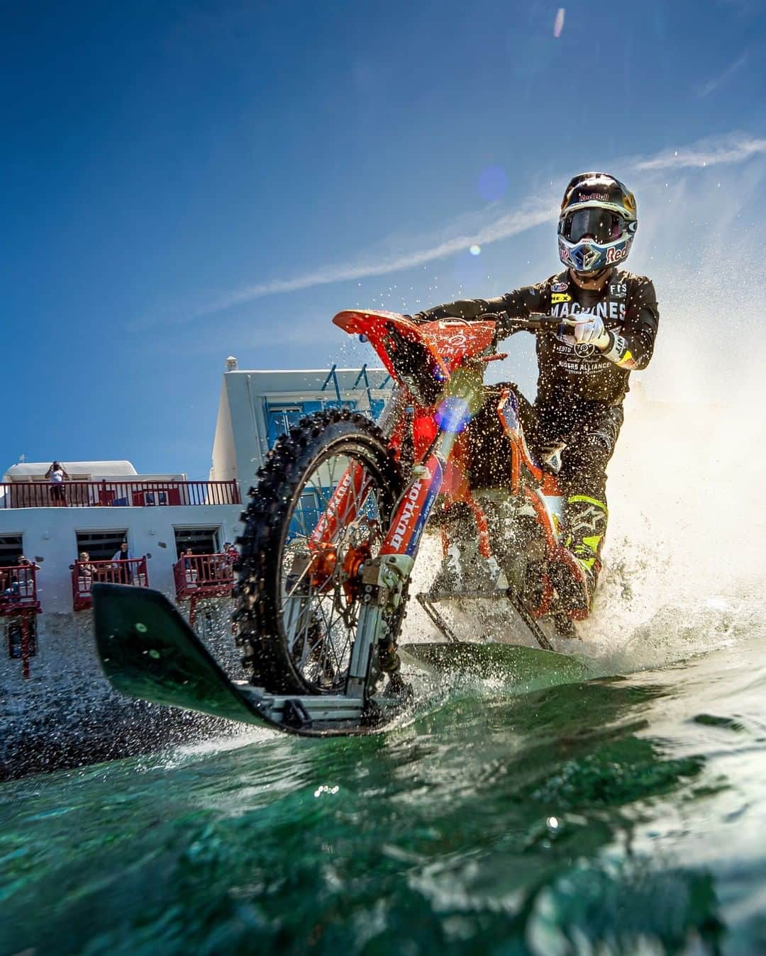 レッドブルのインスタグラム：「that's certainly one way to go sightseeing 🤔   🏍️ 🌊 : @aaroncolton @robbiemaddison  #redbull #givesyouwiiings #motorsports #greece #mykonos #moto #waterski」