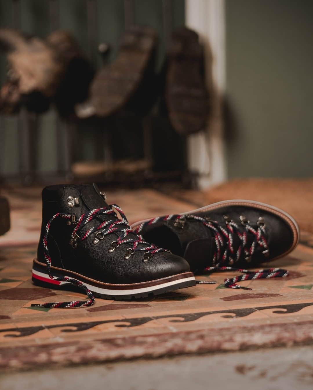 MR PORTERのインスタグラム：「@Moncler's boots are inspired by traditional hiking styles and made from leather that will wear well. They have rubber soles that are substantial but not bulky, and are finished with the signature tricolour striped laces as a nod to the brand's heritage. As if you needed another excuse to head out on a hike. #MRPORTER」