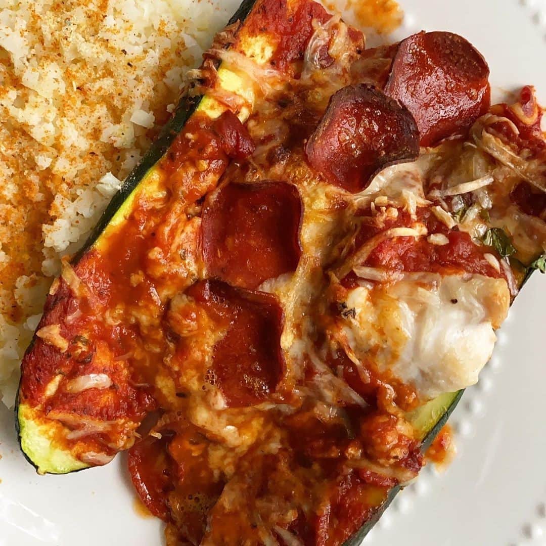Flavorgod Seasoningsさんのインスタグラム写真 - (Flavorgod SeasoningsInstagram)「✨PIZZA STUFFED CHICKEN BAKE✨ by Customer @amber_clemens⁠ -⁠ Seasoned with:👉 #Flavorgod Ranch and Nacho Cheese Seasonings!!⁠ -⁠ KETO friendly flavors available here ⬇️⁠ Click link in the bio -> @flavorgod⁠ www.flavorgod.com⁠ -⁠ "Y’all wanted it, so here it is! The deliciousness that I made for this week’s episode of #OnWednesdaysWeEatPizza 🍕 I’m definitely NOT the first one to make some version of Pizza Chicken, but this is my own little twist on it! I’m fairly certain I first saw the idea on @ashleyanixon ‘s page! 🤗 I’ve been wanting to try making it for awhile and HOLY PIZZA GAWDS, it’s freaking amazing! I decided to put it on top of a sliced zucchini and turn it into a big mountain of cheesy, pepperoni goodness! So so so so so so yummy!"⁠ .⁠ Pizza Stuffed Chicken goods:⁠ • boneless skinless chicken breast⁠ • @kraft_brand FF Mozzarella⁠ • Spinach⁠ • @hormelfoods Turkey Pepperoni⁠ • @prego No Sugar Added Pasta sauce⁠ .⁠ Slice the chicken breast in half and flatten. I covered the chicken with plastic wrap and used my pizza dough rolling pin to roll it flat! Then add some of the pepperoni, all of the spinach (chopped), and some of the cheese to the inside of the chicken. Fold the top half over so it’s covered like a little chicken pizza hot pocket, lol. I sliced the zucchini in half and placed it in a baking dish lined with foil. Then I added the stuffed chicken on top of the zucchini, covered with the sauce, the rest of the cheese, and the rest of the pepperoni! Bake at 400 for 35 minutes, with the broiler on low for the last 10!! It makes the cheesy so bubbly and melty! 🤤⁠ .⁠ Btw, I seasoned the chicken with Italian seasoning, garlic & onion powder, and S&P!⁠ .⁠ I paired mine with a side of cauliflower rice seasoned with @flavorgod Ranch & Nacho Cheese!⁠ -⁠ Flavor God Seasonings are:⁠ 💥ZERO CALORIES PER SERVING⁠ 🔥0 SUGAR PER SERVING ⁠ 💥GLUTEN FREE⁠ 🔥KETO FRIENDLY⁠ 💥PALEO FRIENDLY⁠ -⁠ #food #foodie #flavorgod #seasonings #glutenfree #mealprep #seasonings #breakfast #lunch #dinner #yummy #delicious #foodporn」10月22日 10時01分 - flavorgod