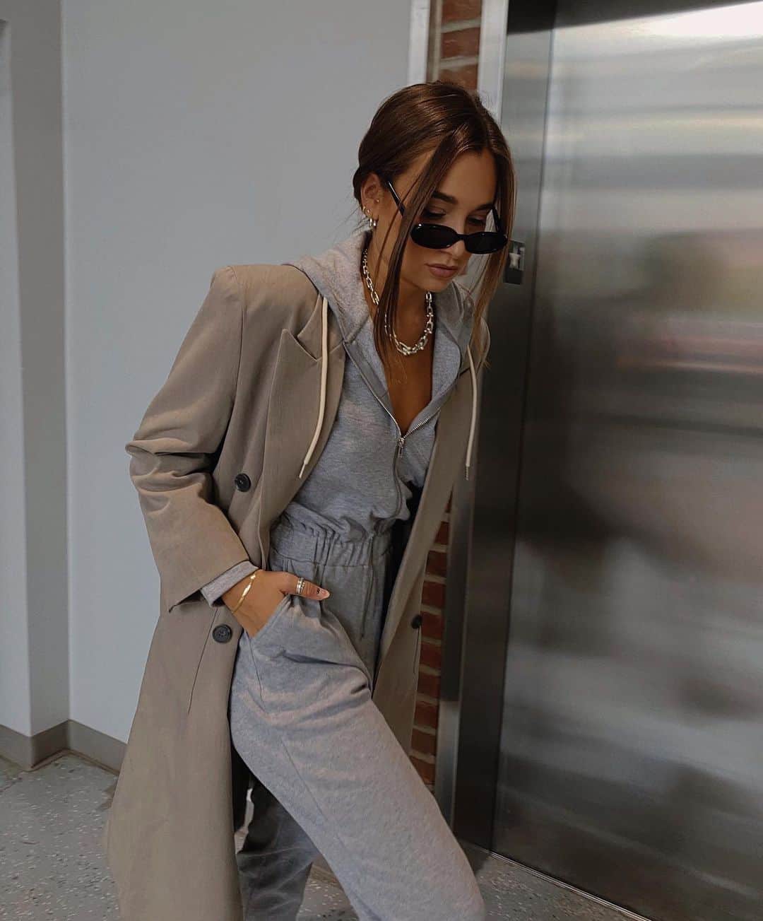 We Wore Whatのインスタグラム：「This may or may not be the coziest sweatshirt jumpsuit of my dreams and may or may not be part of @shopweworewhat H21 denim & jumpsuits launch in three weeks 🙃 will start revealing new styles tomorrow!」