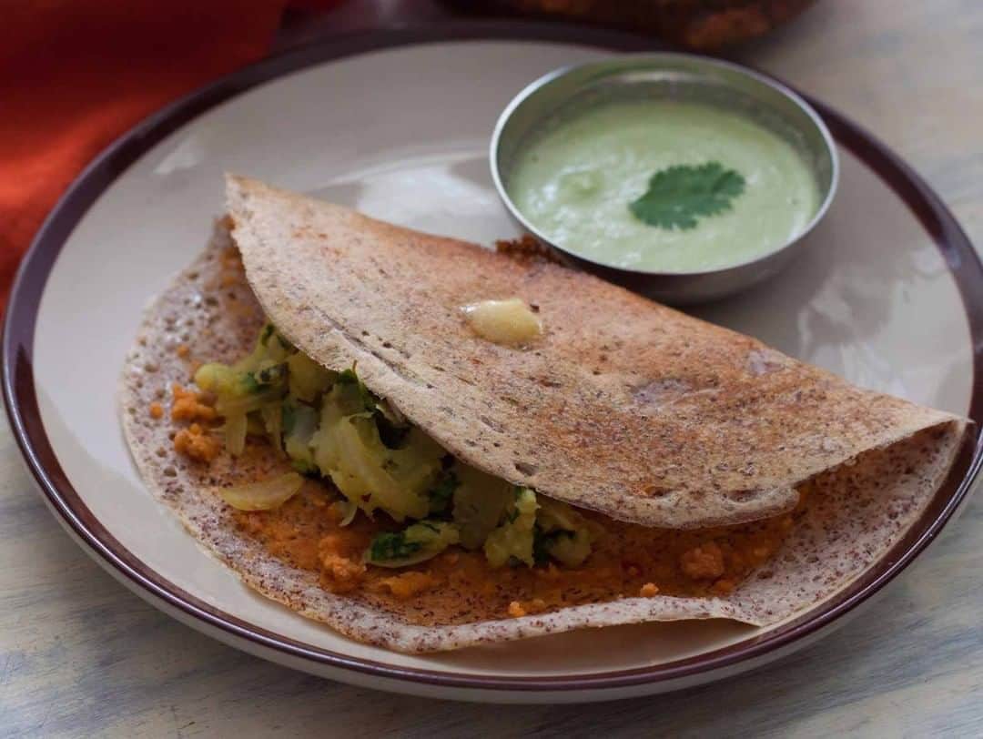 Archana's Kitchenさんのインスタグラム写真 - (Archana's KitchenInstagram)「You must try this delicious Mysore Masala Dosa Recipe which is smeared with red chilli chutney and stuffed with potato filling and served with chutney and sambar. This dosa is made with ragi idli dosa batter adding to the taste and nutrition. Get the recipe from the smart.bio link in my profile @archanaskitchen . . . . . #recipes #easyrecipes #breakfast #Indianbreakfast #archanaskitchen #healthyeating #upma #southindianbreakfast #highprotein #breakfastclub #dosa #dosarecipes #dosabatter #ragi #ragidosa #mysoremasaladosa #homemadefood #eatfit #cooking #food #healthyrecipes #foodphotography #recipeoftheday #comfortfood #deliciousfood #delicious #instayum #food」10月23日 12時29分 - archanaskitchen
