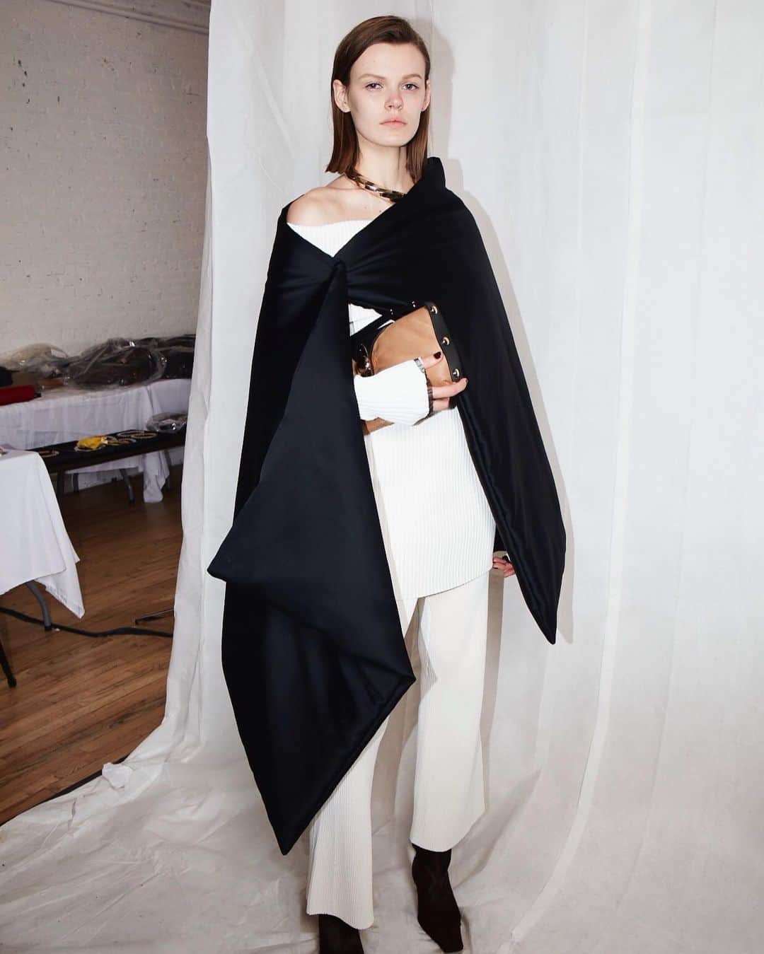 プロエンザスクーラーのインスタグラム：「Blanketed @cara_taylorrr in the Padded Satin Blanket Find more of the new collection on proenzaschouler.com and 121 Greene St NY, NY Photography @ulrichknoblauch_  #proenzaschouler」