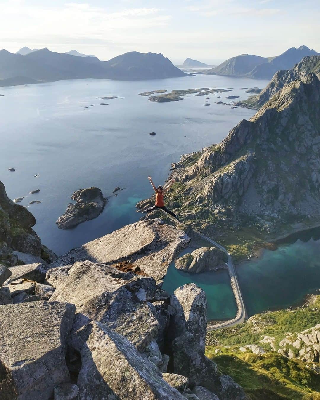 ミレーのインスタグラム：「Joyful @manonbzzbzzz in front of the Norwegian fjords few months ago.  Sometimes, hapiness is as simple as jumping on rocks with a view.  📷 @symon9v   #MilletRiseUp」