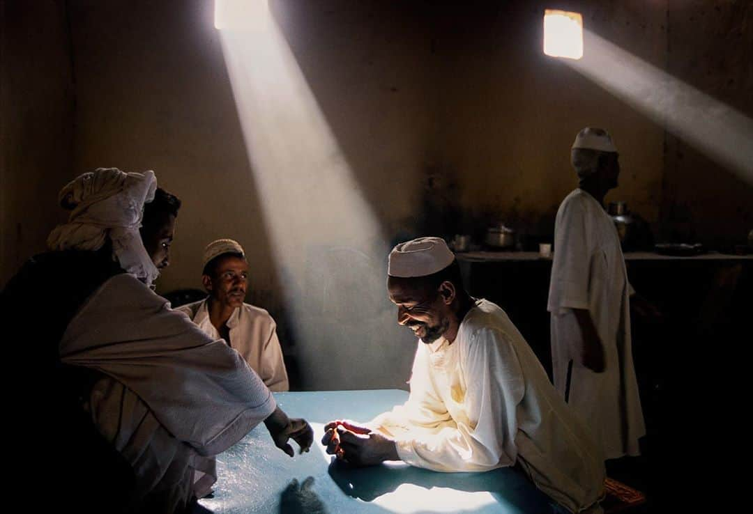 thephotosocietyさんのインスタグラム写真 - (thephotosocietyInstagram)「Photo by @randyolson // Sometimes all you need is good light. This is a restaurant on the outskirts of Khartoum, in North Sudan in 2003. Northern Sudanese (like these men) are oblivious to the civil war raging in the south because they don’t have to fight it. The Northern Government of Sudan would force southerners into the refugee ring around Khartoum and kidnap the young men from the south to be soldiers for the north.  #sudan」10月25日 0時23分 - thephotosociety