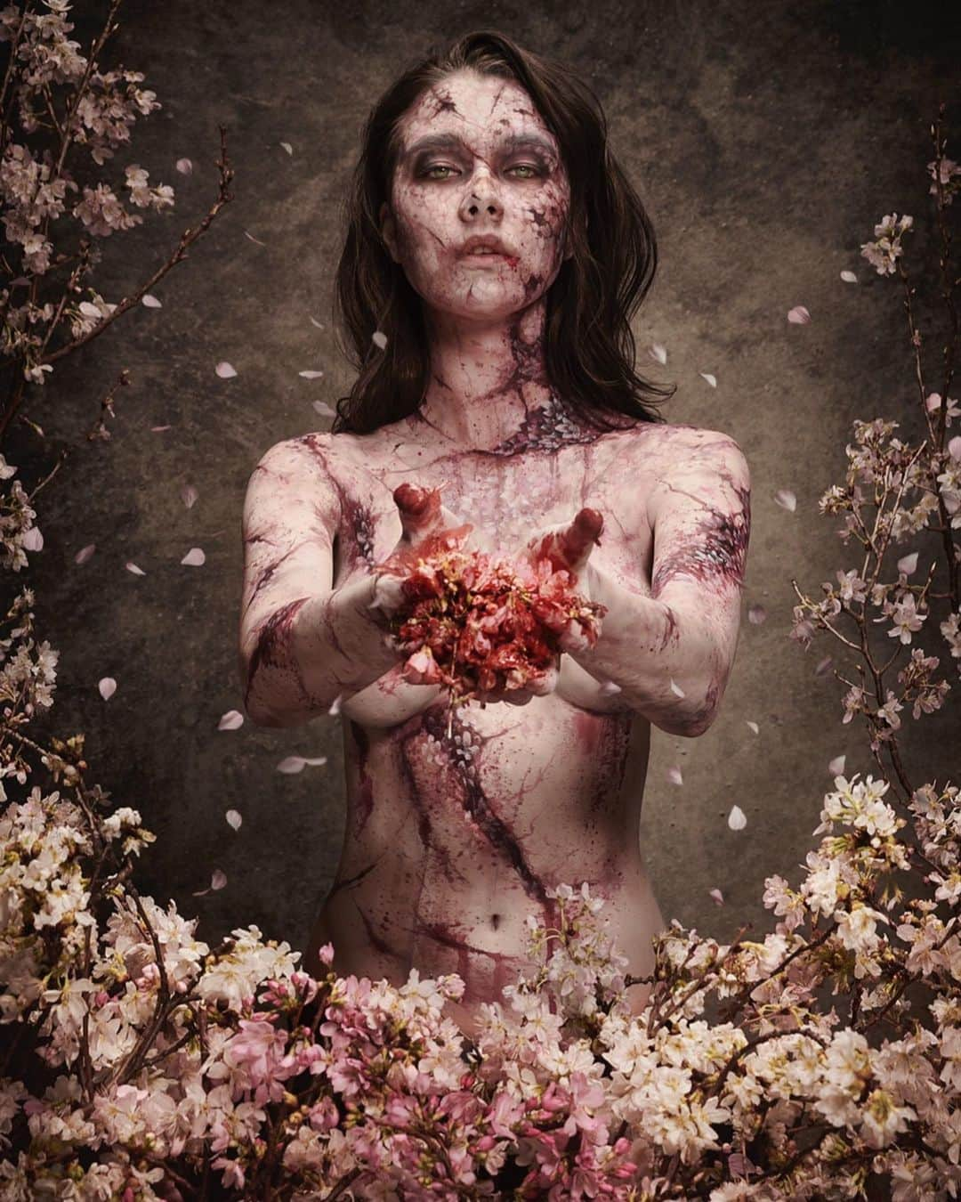 Amazing JIROのインスタグラム：「Now exhibiting at the Joint Gallery @joint_gallery ． Flower Zombie - Spring - ． The flower that is beautiful but “fleeting” and the zombie who “continue to live” even though it’s dead. I depicted the view of life and death, which is opposite by adding the colors of four seasons.  ． Body Paint : Amazing JIRO Flower Collaborator : Daisuke Shimura @daisuke_shim Model : Cera @by.cera @envemanagement Photo : Youhei Kodama @kodamax_photo ． #amazing_jiro #art #exhibition #artexhibition #jointgallery #harajuku #tokyo #facepaint #bodypaint #makeup #sfx #sfxmakeup #fxmakeup #zombiemakeup #zombie #fantasymakeup #scarymakeup #horrormakeup #halloweenmakeup #creativemakeup #crazymakeup #メイク #フェイスペイント #ボディペイント #特殊メイク #ゾンビ #ゾンビメイク #アート #展示会 #原宿」