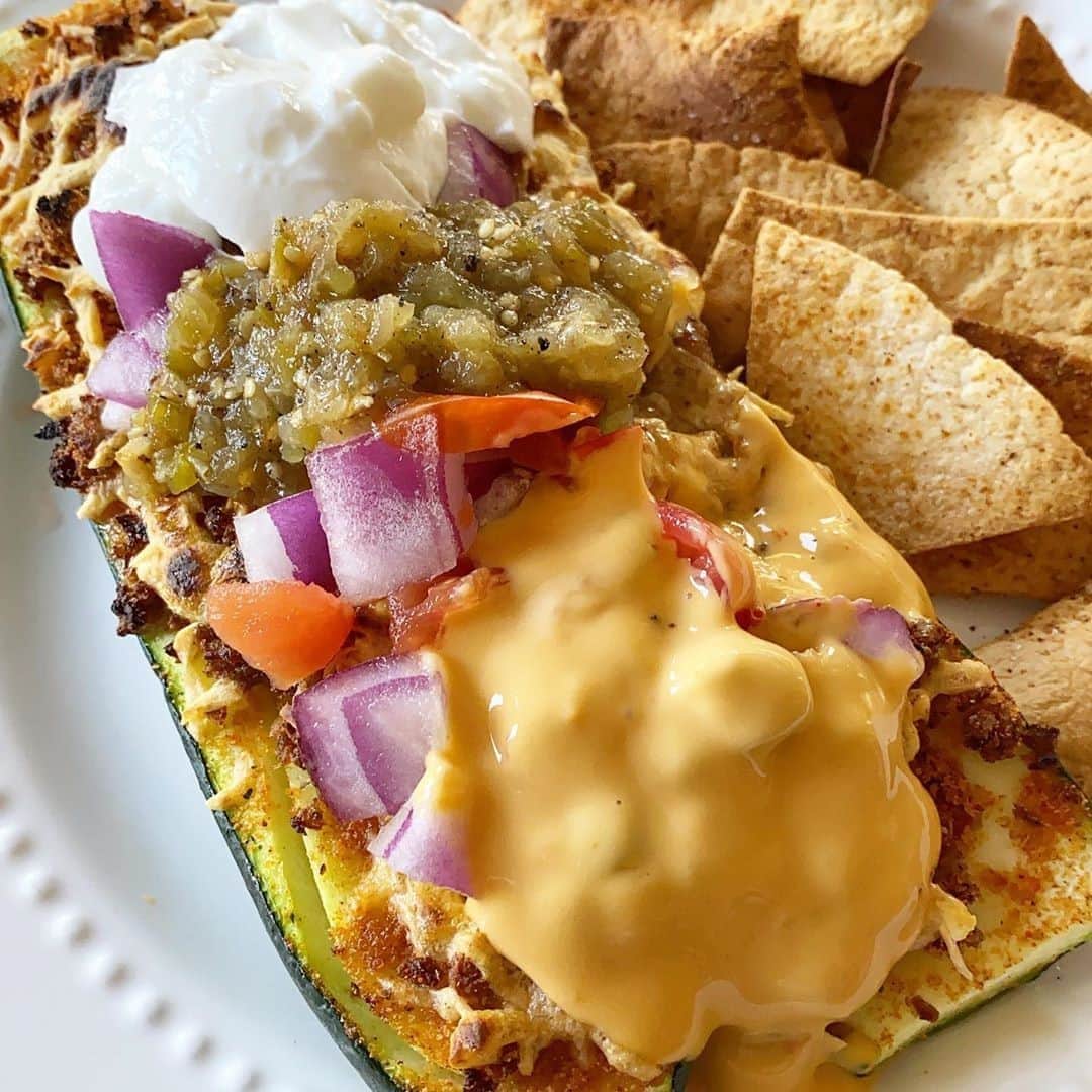 Flavorgod Seasoningsさんのインスタグラム写真 - (Flavorgod SeasoningsInstagram)「Taco ✨ zucchini ✨ bake ✨ w/ homemade Doritos ✨⁠ -⁠ Customer:👉 @amber_clemens⁠ Seasoned with:👉 #Flavorgod TacoTuesday & Nacho Cheese seasonings⁠ -⁠ Add delicious flavors to any meal!⬇⁠ Click the link in my bio @flavorgod⁠ ✅www.flavorgod.com⁠ -⁠ Soooo sometimes you have a thought, and sometimes it turns into a big, beautiful plate of yummy! Enter; tonight’s dinner 🤤⁠ .⁠ Usually when I make zucchini boats, I scoop out the insides but this time, I just cut off the stem end, sliced it in half and built from there! Add your favorite taco meat (I used the @aldiusa Earth Grown Vegan Crumbles seasoned with @flavorgod Taco & Nacho Cheese seasonings) and cheese, bake, and then add allllllll your favorite taco toppings! oh my LAWD, it’s so good!⁠ .⁠ For the “Doritos”, I sliced up 1 @olemex_labanderita Carb Counter tortilla, sprayed with avocado oil, seasoned with sea salt and the same @flavorgod Nacho Cheese Seasoning and air fried at 360 for about 15minutes! Perfectly crispy! These definitely had a Doritos vibe! Next time I’ll up the amount of the Nacho seasoning and I think it’ll be perfect!⁠ .⁠ Taco Zucchini Bake Beautifulness:⁠ • 1 zucchini⁠ • @aldiusa Vegan Crumbles⁠ • @kraft_brand FF Cheddar⁠ • @krogerco Fat Free Sour Cream⁠ • @aldiusa Salsa Verde⁠ • @tostitos Salsa Con Queso⁠ • red onion⁠ • tomato⁠ .⁠ Slice the zucchini, top with the frozen crumbles, and sprinkle on your seasonings. I baked that at 425 for 10 minutes and then added the cheese! Bake for another 10-15 minutes until the cheese is melty! Take out of the oven and add your toppings! Pair with the chips and dig in!⁠ .⁠ Best part? The chips make an excellent vessel for all the extra toppings! Hello nachos! 😍😍🤤🤤🤤⁠ -⁠ Flavor God Seasonings are:⁠ ✅ZERO CALORIES PER SERVING⁠ ✅MADE FRESH⁠ ✅MADE LOCALLY IN US⁠ ✅FREE GIFTS AT CHECKOUT⁠ ✅GLUTEN FREE⁠ ✅#PALEO & #KETO FRIENDLY⁠ -⁠ #food #foodie #flavorgod #seasonings #glutenfree #mealprep #seasonings #breakfast #lunch #dinner #yummy #delicious #foodporn」10月25日 10時00分 - flavorgod