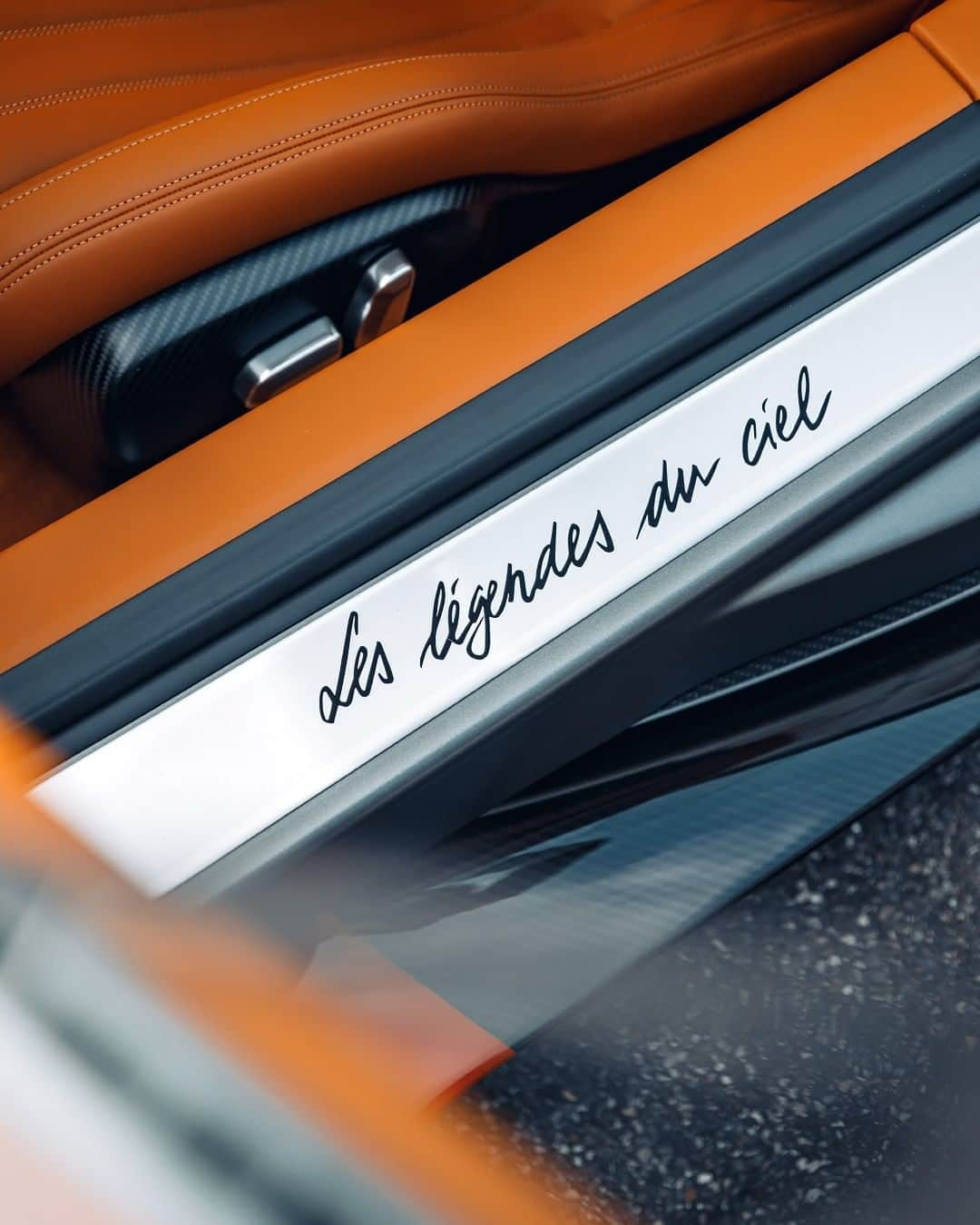 ブガッティさんのインスタグラム写真 - (ブガッティInstagram)「Today we are paying tribute to BUGATTI’s Daredevils with the exclusive edition of the CHIRON Sport “Les Légendes du Ciel”. Inspired by the intrepid nature of the pilots of the past, this one-of-a-kind CHIRON Sport pays homage to the heroes who inspire us to this day, in matt “Gris Serpent” and with a Gaucho leather interior reminiscent of the aircrafts our daredevils flew.   #BUGATTI #BUGATTILegendesDuCiel #LegendesDuCiel #CHIRONSport  _ Fuel consumption, l/100km: 36.7 in urban areas / 15.8 in extra urban areas / 23.5 combined; combined CO2 emissions g/km: 553; efficiency class: G」11月25日 0時01分 - bugatti