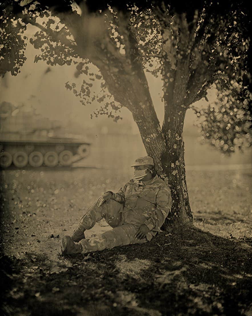 National Geographic Creativeさんのインスタグラム写真 - (National Geographic CreativeInstagram)「Photo by Rashod Taylor @rashodtaylorphoto / Staff Sergeant Vanessa Lewis Williams of the Georgia Army National Guard sits for a tintype portrait at the Georgia National Guard Readiness Center in Macon, GA. Vanessa Lewis Williams and her family are being photographed for a project documenting black military families in the USA.   (1) Vanessa Lewis Williams. (2) Rashod Taylor and Vanessa Lewis Williams looking at her image reverse in the fixer as part of the wet plate collodion process. Video by @carynorton  Taken on assignment for @natgeo #onassigment #militaryfamily #usa #georgia」11月21日 0時18分 - natgeointhefield