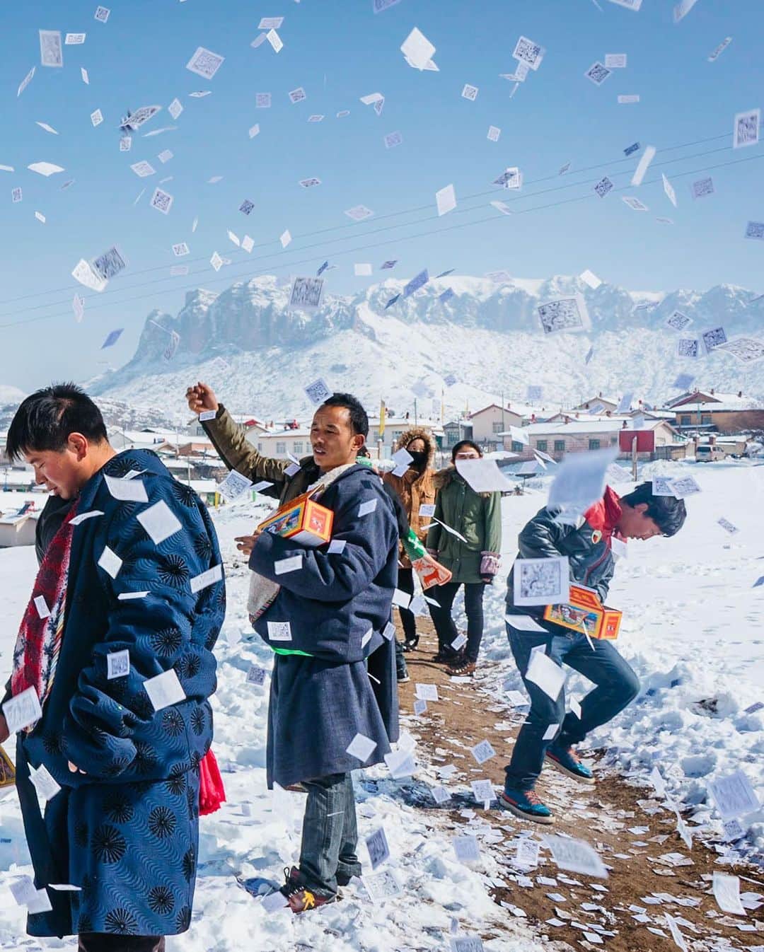 National Geographic Travelさんのインスタグラム写真 - (National Geographic TravelInstagram)「Photo by @junmichaelpark / Tibetans throw prayer papers for good fortune during Monlam at Langmu, Gannan Tibetan Autonomous Prefecture, Gansu Province, China. Monlam, or the Great Prayer Festival, takes place at the beginning of the Tibetan New Year and is one of the largest festivals for Tibetan Buddhists. Swipe left to view the full image and follow @junmichaelpark for more.」11月21日 0時39分 - natgeotravel