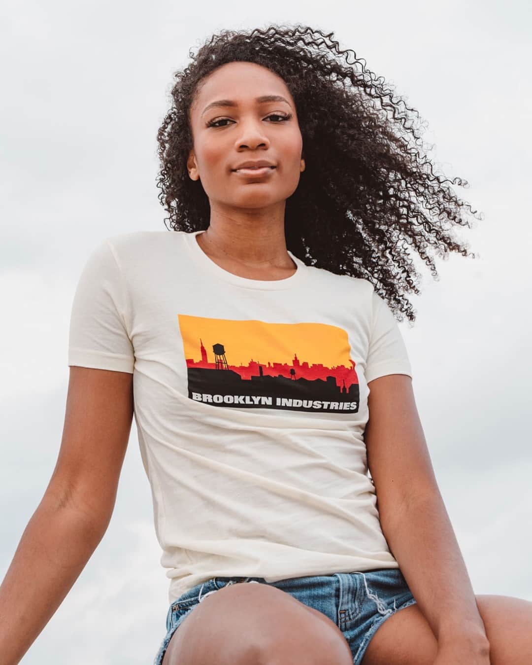ブルックリンインダストリーズのインスタグラム：「Ari in the Skyline Logo Graphic T-shirt.  Give the gift of Brooklyn Graphics this holiday season.  #liveworkcreate #brooklynindustries」