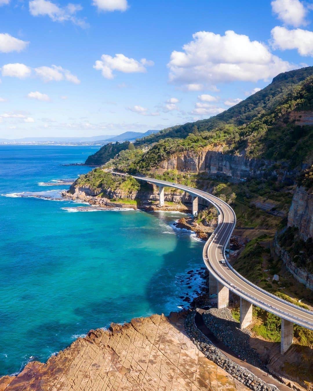 Australiaさんのインスタグラム写真 - (AustraliaInstagram)「Anyone up for a road trip? 🚗 😎 The #SeaCliffBridge along the @GrandPacificDrive is an epic #roadtrip destination – just ask @ronnie_sparke who spent a long weekend touring this photogenic part of @visitnsw. You’ll find this magnificent bridge just an hour out of @Sydney on your way to @visitwollongong and @kiamansw. As you wind your way along the cliff face be sure to stop off at some of the local sights like Wollongong Head Lighthouse and Woonona Rock pool near #Wollongong, Cathedral Rock in #Kiama and the famous #KiamaBlowhole. #seeaustralia #NewSouthWales #visitwollongong #grandpacificdrive #holidayherethisyear」11月22日 4時00分 - australia