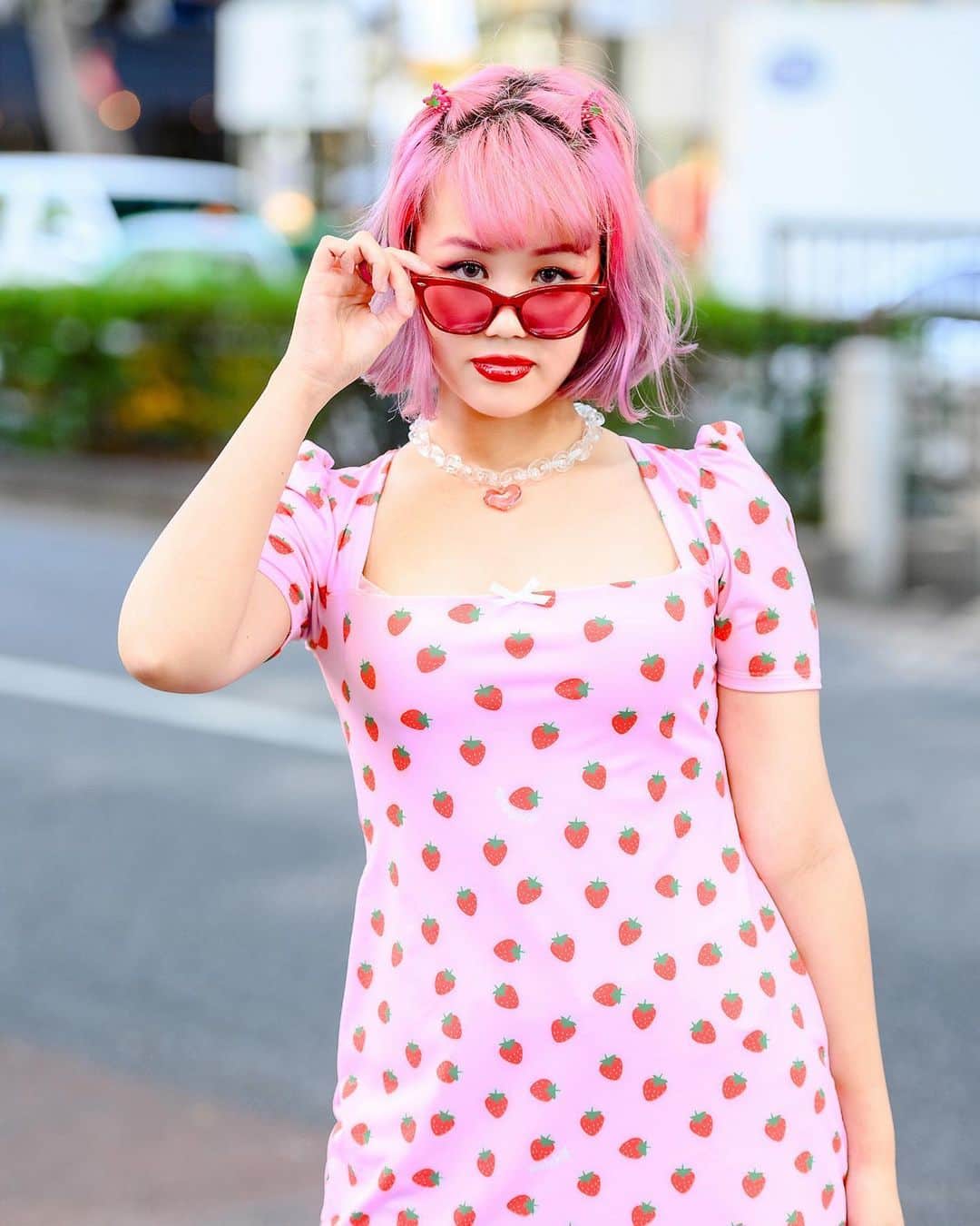 Harajuku Japanさんのインスタグラム写真 - (Harajuku JapanInstagram)「20-year-old Japanese student Harupika (@haru____pika) on the street in Harajuku wearing an O-Mighty strawberry print dress with a Sugar Thrillz mini handbag, pink tinted glasses, a heart necklace, and heart cutout boots.」11月22日 5時30分 - tokyofashion