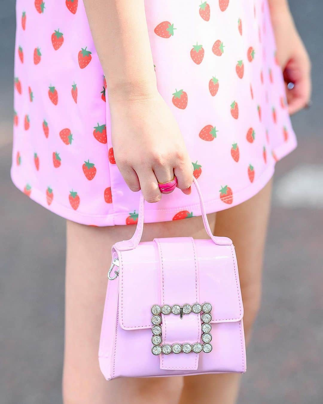 Harajuku Japanさんのインスタグラム写真 - (Harajuku JapanInstagram)「20-year-old Japanese student Harupika (@haru____pika) on the street in Harajuku wearing an O-Mighty strawberry print dress with a Sugar Thrillz mini handbag, pink tinted glasses, a heart necklace, and heart cutout boots.」11月22日 5時30分 - tokyofashion