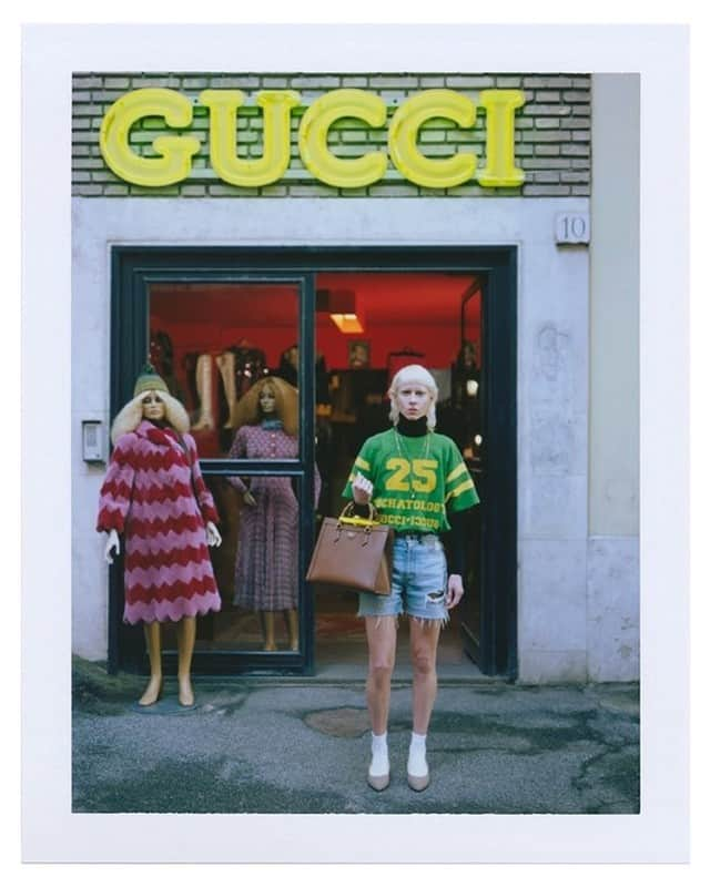 グッチさんのインスタグラム写真 - (グッチInstagram)「New looks revealed in Episode 6 ‘At The Vintage Shop’ including eco denim washed shorts, a printed T-shirt with the year 1921—the year Gucci was founded, and the Bamboo leather tote with fluorescent leather belt on the handle, detachable shoulder strap and GG detail worn by @silviacalderoni. Captured by @gus_van_sant, a girl in a blue skirt and embroidered crew neck and a boy in flared denims with matching vest and checked shirt. Follow the GucciFest fashion and film festival and watch the new episode through link in bio or on @gucci. #GucciFest #GucciOuverture #AlessandroMichele @alessandro_michele #Gucci1921 #GucciJackie1961 #GucciHorsebit1955」11月22日 7時30分 - gucci