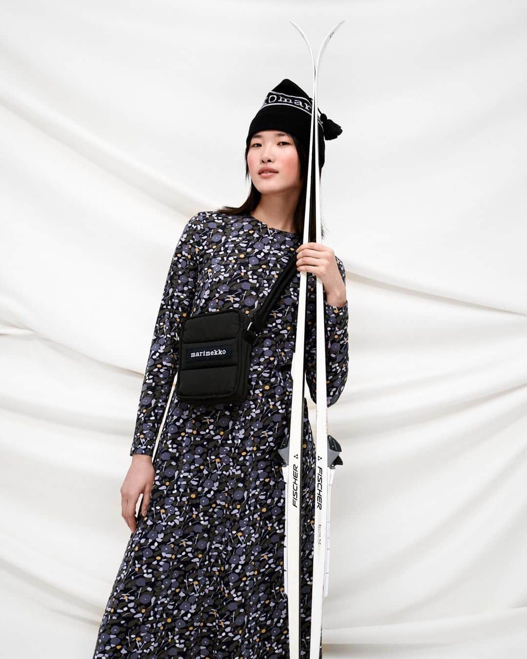 マリメッコのインスタグラム：「Our new collection was inspired by Finnish wintertime activities. No snow or skiing in sight here in the North just yet, but that doesn't stop us from mixing relaxed festive wear together with sportier pieces and accessories for a tech-glam twist. Find Sivakka dress and our new accessories at marimekko.com and in-store. #marimekko」