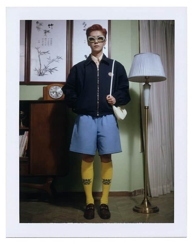 のインスタグラム：「In the seventh episode from ‘Ouverture Of Something That Never Ended,’ #LuHan @7_luhan_m wears a blouson with Interlocking G patch detail, silk shirt with buttoned collar and epaulets, jogging short pants, oversize oval #GucciEyewear sunglasses with tinted yellow lenses, a single cross motif earring in sterling silver, long socks with @chatsworthofficial’s crest and a #GucciJackie1961 leather bag. Watch all episodes from the 7-Part series through link in bio or on @gucci. #GucciFest #GucciOuverture #AlessandroMichele @alessandro_michele」