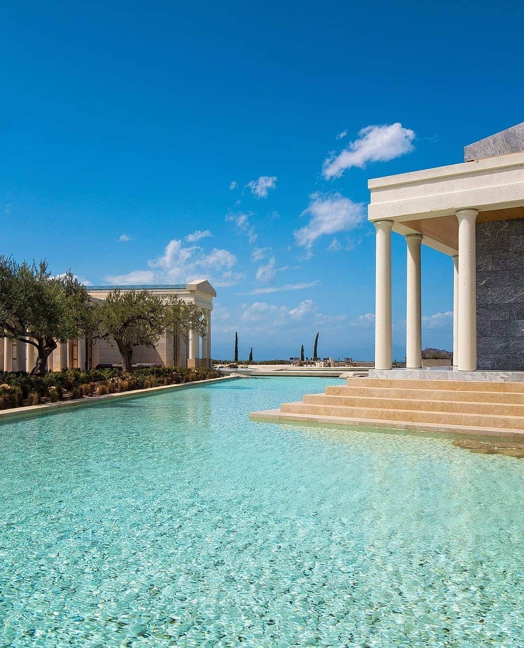 BEAUTIFUL HOTELSさんのインスタグラム写真 - (BEAUTIFUL HOTELSInstagram)「Experience a modern-day acropolis of serenity and luxury. 🇬🇷 At Amanzoe's collection of villas and private pools, you'll get an immersive wellness retreat with 270-degree views of the Aegean Sea. 🌊   Designed by Aman architect Ed Tuttle, the Amanzoe Spa has a 2,850 square meter space of relaxation, with treatments inspired by the teachings of Hippocrates.🧖‍♀️ Ideal for couples and families alike, the Amanzoe Beach Club has two lap pools and two children’s pools for fun and games in total privacy by the water.🏊  If you're a legends buff, the Peloponnese region is where Paris of Troy eloped with Helen and the Argonauts set sail for the Golden Fleece.📚 How lovely is this retreat?  📍@amanzoe, Porto Heli, Greece」11月23日 23時17分 - beautifulhotels