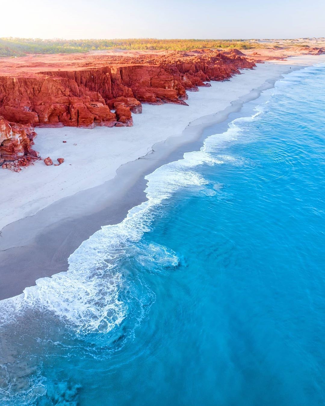 Australiaさんのインスタグラム写真 - (AustraliaInstagram)「We're seriously lucky enough to have this in our own backyard 😍 The striking contrast of the red cliffs, white beaches and turquoise water of #CapeLeveque are just as magical in real life. Just ask @yawuru.wanderer who snapped this while staying at @kooljaman, an off-the-grid wilderness camp north of #Broome in @australiasnorthwest. To get a similar bird's-eye view, hop on a scenic flight with @flybroome or @airkimberley. A must-visit destination in @westernaustralia, this rugged slice of #TheKimberley has a deep Aboriginal heritage and is a popular spot for swimming, snorkelling, whale watching and fishing. #seeaustralia #thisisWA #MagicKimberley #experienceardi #koolijaman #holidayherethisyear」11月23日 19時00分 - australia