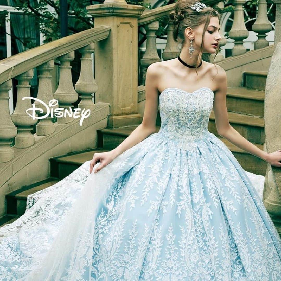 St.AQUA 東京の結婚式場 サンアクアチャペルのインスタグラム：「●DWS0041（blue） シンデレラをイメージしたブルーをキラキラ感のあるスパンコールレースで表現。 シンデレラが魔法にかけられる瞬間をイメージ。レース柄が上品な高級感を感じさせます。 #disney #disneyprincess #disney_weddingdresscollection #wedding #weddingdress #dress #bridal #colordress #ディズニー #ディズニー_ウエディングドレス コレクション #ディズニープリンセス #プリンセス #シンデレラ #cinderella #カラードレス #ブルー #blue #ウェディングドレス  #ドレス #ディズニードレス #結婚式 #結婚 #プレ花嫁 #卒花嫁 #花嫁 #ブルードレス #bluedress  #クラウディア #kuraudia   ディズニーオフィシャルホテルへの持ち込みは ご遠慮いただいております。 ©Disney」