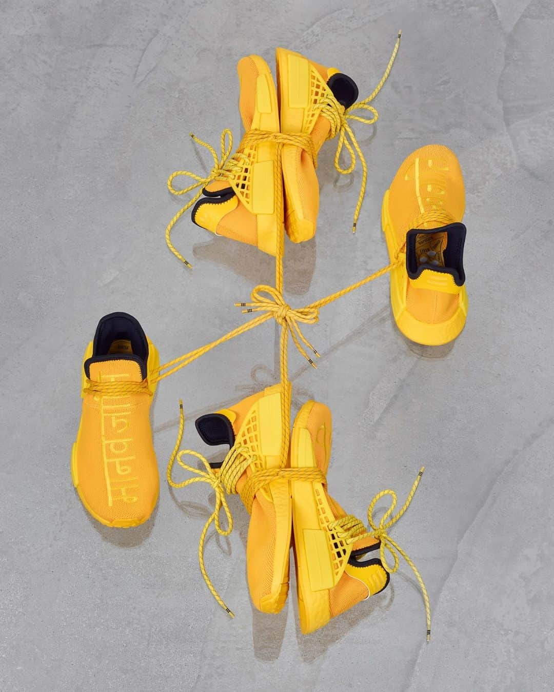 adidas Originalsのインスタグラム：「In collaboration with @pharrell, we present drop three of the PW HU NMD in a vivid Bold Gold colorway and a stitched graphic which reads ‘Human Race’ in Hindi.  Available globally on November 7th on adidas.com, Confirmed, and select retailers.」