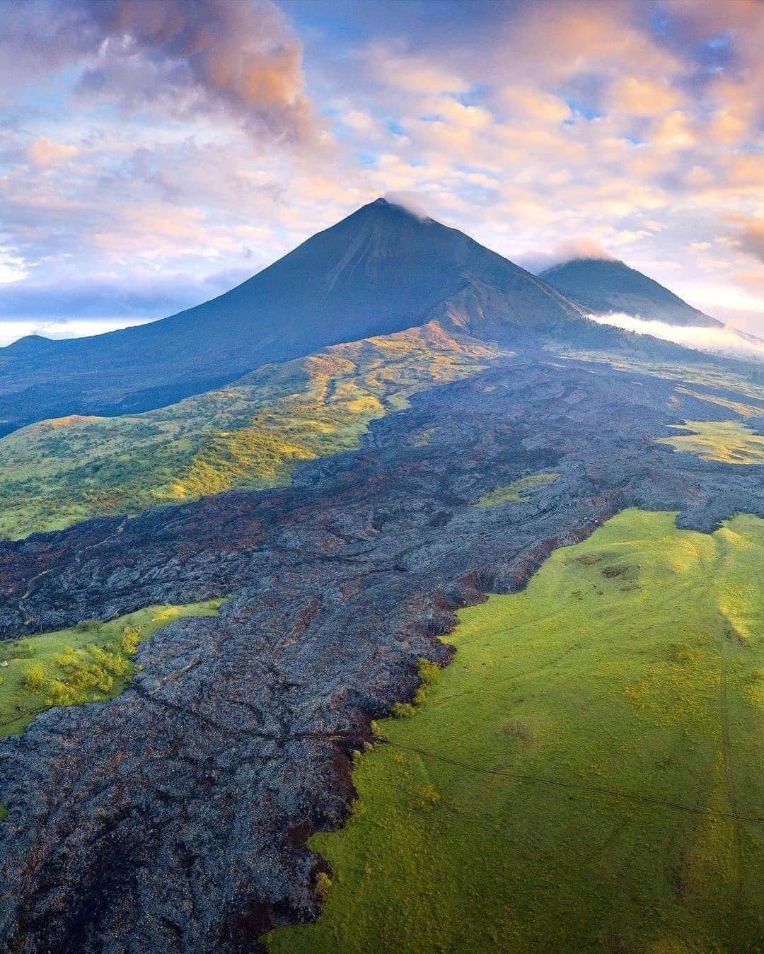 Discover Earthさんのインスタグラム写真 - (Discover EarthInstagram)「Pacaya volcano is one of Guatemala's most active volcanoes. This volcano is a part of the Central American Volcanic Arc, a chain of volcanoes stretching from the northwest to the southeast along the Pacific coast of Central America, formed by the tectonic subduction of the Cocos Tectonic Plate beneath the Caribbean Plate. Pacaya rises to an elevation of 2,552 metres (8,373 ft).  #discoverguatemala🇬🇹 with @geomorphological_landscapes  📷 @explorefeelgood @davidphotoimagen  @hartmannphotography_adventures  @saldanarobin10  📽️ @gabrieltl  . . . . .  #guatemala ​#quepeladoguat  #guategram ​#guat ​#perhapsyouneedalittleguatemal  #instaguate  #huntgramguatemala  #guatemalan  #therealguatemala  #guatelinda  #quechileroguate  #elmaizgt  #chapin ​#elsalvado  #volcano  #volcan  #lava  #vacation  #summer  #picoftheday」10月31日 21時00分 - discoverearth
