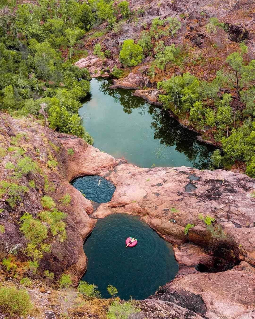 Australiaさんのインスタグラム写真 - (AustraliaInstagram)「Welcome to relaxation station, AKA #SurpriseCreekFalls in @NTaustralia 😎 @all.about.adventure took this photo while cooling off in beautiful #LitchfieldNationalPark, which is located south of #Darwin in @tourismtopend. This time of year you'll find a plethora of thundering falls and enticing plunge in this nature-packed area, as well as towering termite mounds, and even a mysterious "Lost City". Check out the link in our bio to discover what other hidden gems can be found here. #seeaustralia #NTAustralia #tourismtopend #HolidayHereThisYear」11月1日 19時51分 - australia