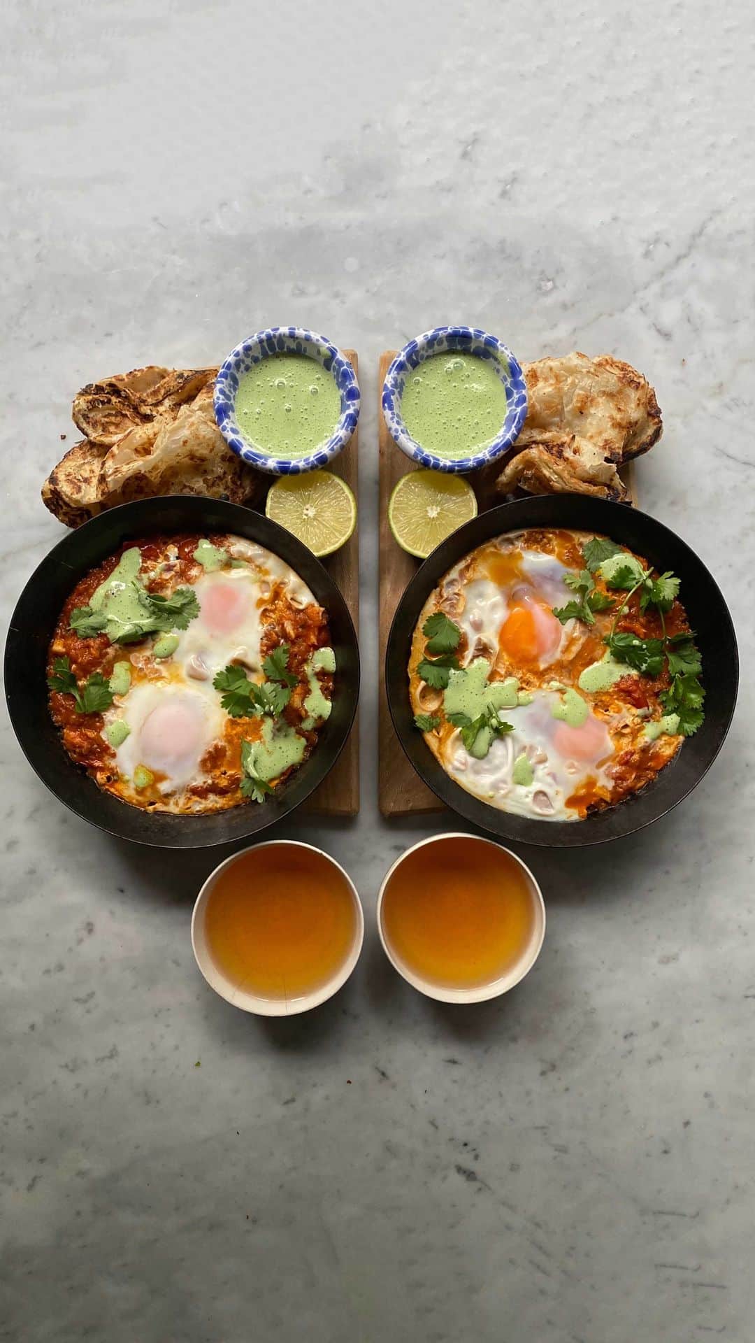 Symmetry Breakfastのインスタグラム：「Takeover time! Hello guys! I’m @mariemitchellchef of @islandsoclub 🎉 taking over Michael’s page for the day. I’m going to show you how to make my saltfish baked eggs with roti and a lime coriander dip. Inspired by ackee and saltfish, the national dish of Jamaica. Follow along on IGTV for the recipe and come over to my page for more details! #islandsocialclub #mariemitchellchef」