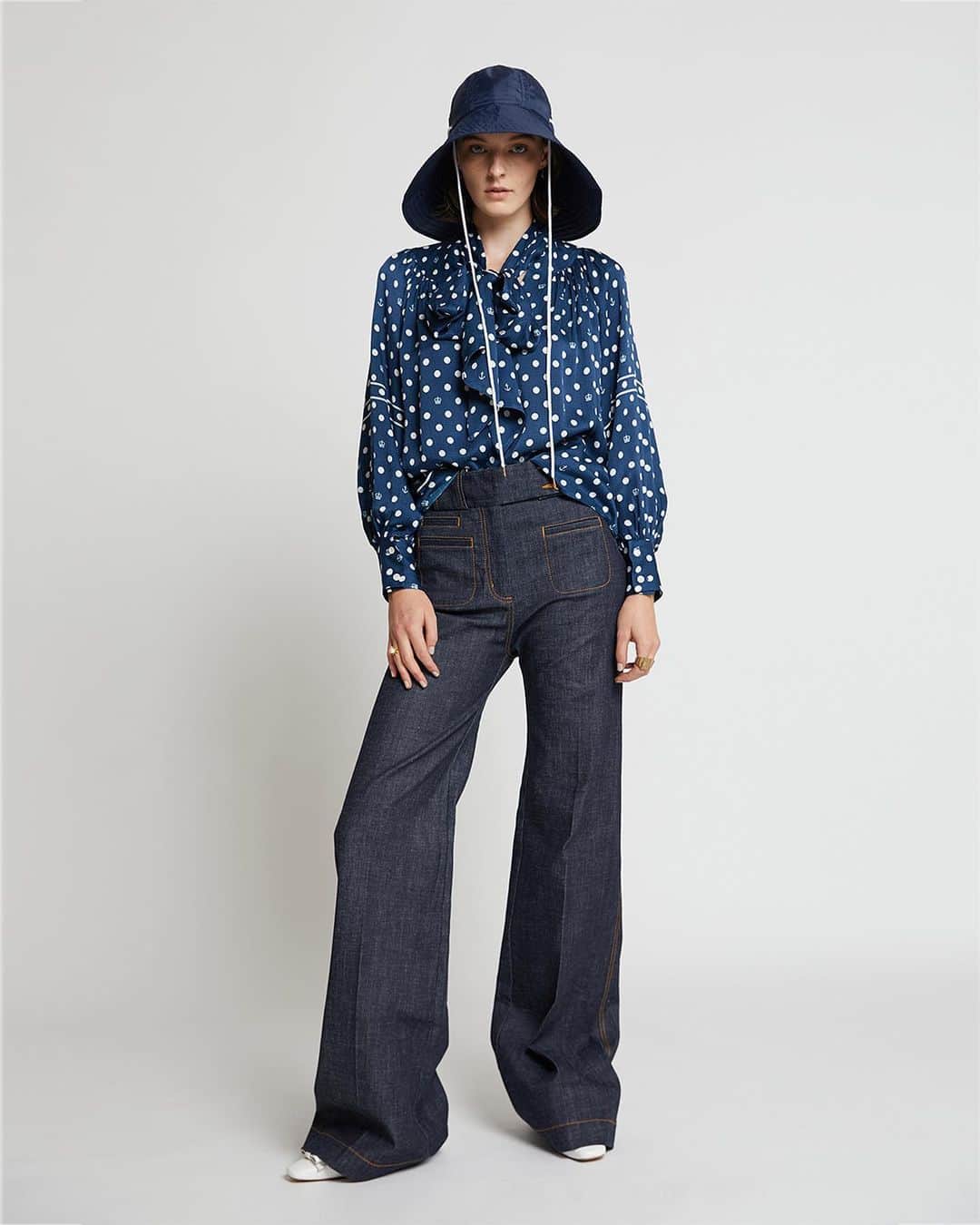 カレンウォーカーのインスタグラム：「Say ahoy to our new collaboration: Royal New Zealand Yacht Squadron x Karen Walker. The Club was founded in 1871 and to celebrate  its sesquicentenary we’ve created a classic polka dot interspersed with the Squadron’s own crown and anchor.」