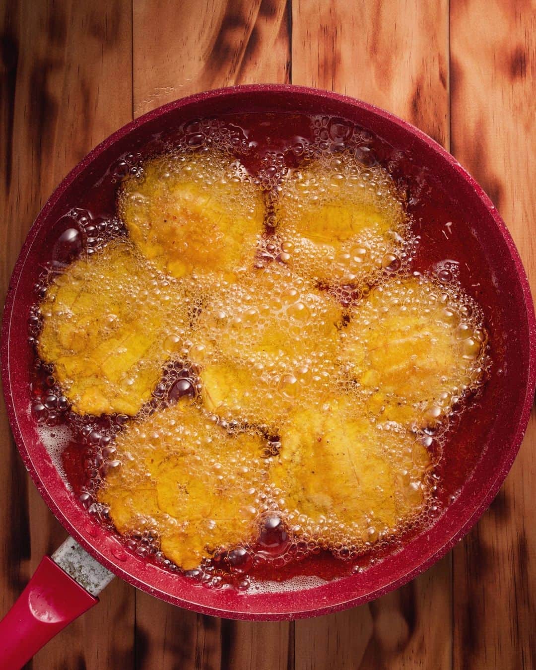 The New Yorkerさんのインスタグラム写真 - (The New YorkerInstagram)「"When I think of a batter-in-a-frying-pan meal that brings maximal pleasure, now as ever, what comes to mind is my mom’s banana fritters," Bryan Washington writes. "They’re my lodestar, topped with a little bit of powdered sugar and a splash of condensed milk, from a can that’s likely been long forgotten under the kitchen counter, only to prove clutch at the last minute, instantaneously miracle-worthy. The recipe’s a staple among Jamaican households, and, if you’re even a semi-regular baker, you likely already have on hand all the ingredients you’ll need for a batch.” Tap the link in our bio for the recipe. Photograph by Maxine Lock / Alamy.」11月2日 9時30分 - newyorkermag